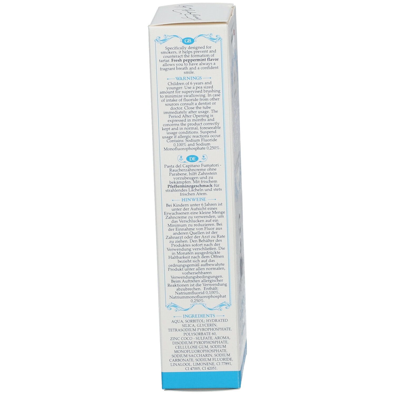 Seite der Zahncreme-Schachtel. Text in mehreren Sprachen. Enthält Informationen zur Anwendung und Inhaltsstoffe. Blau-weiße Farbgebung.