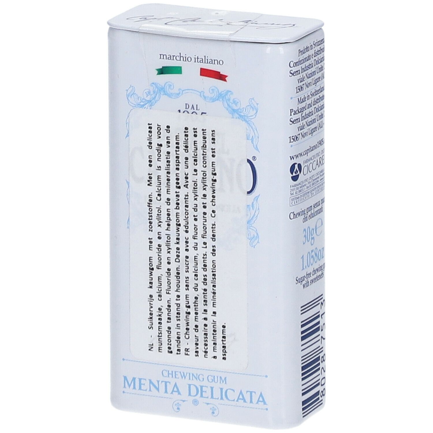 Rückseite einer weißen Metallbox mit Text. 'Chewing gum' und 'Menta delicata' sind sichtbar.