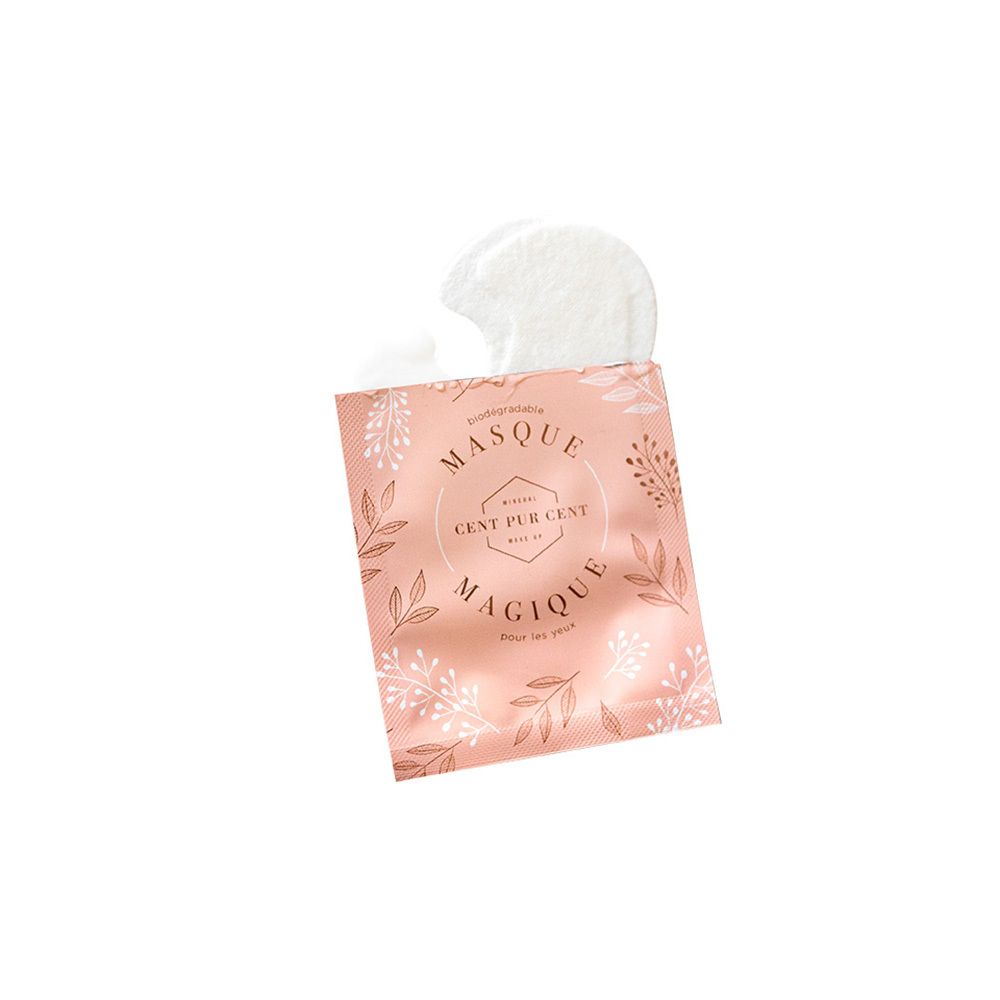 Open roze verpakking met twee oogmaskers. Tekst: Masque Magique pour les yeux.