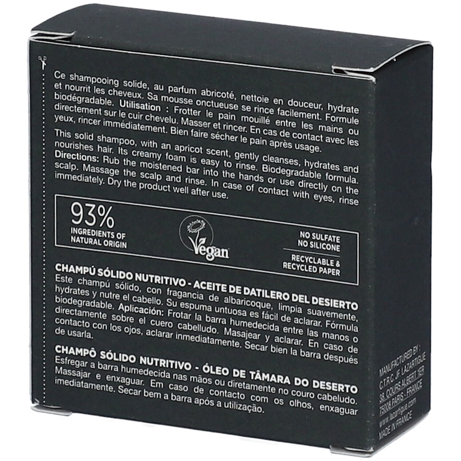 Rückseite einer schwarzen Schachtel. Text in mehreren Sprachen. Enthält Informationen über das feste Shampoo und Inhaltsstoffe.