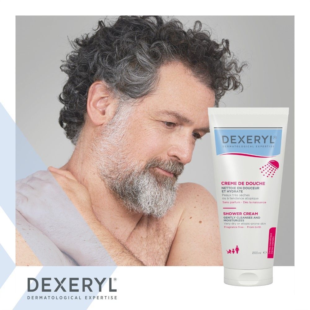 Dexeryl Crème De Douche Tube. Mann mit Produkt. Rosa Duschsymbol. Für sehr trockene Haut.