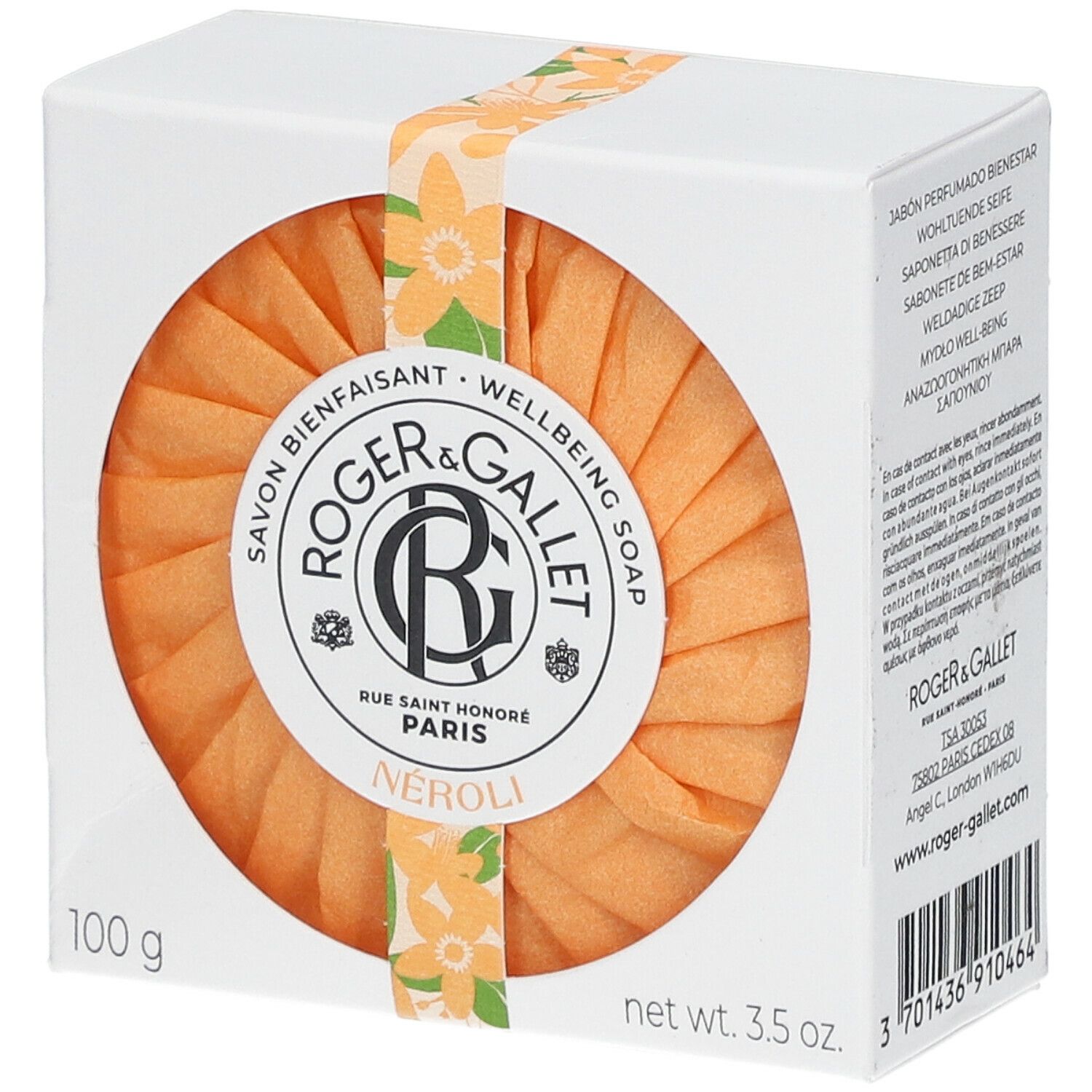 Savon rond orange dans une boîte blanche. Marque Roger & Gallet, Néroli. Emballé avec un ruban floral.