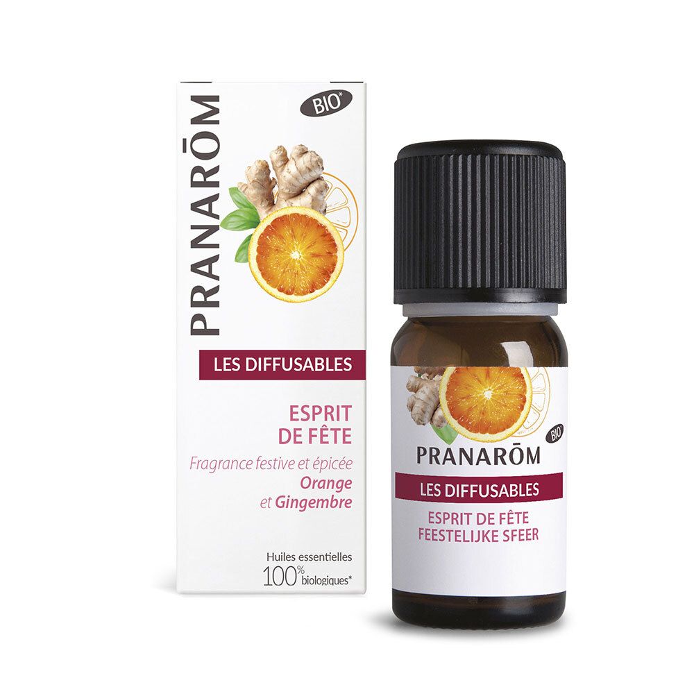 Flacon et boîte en verre brun. Inscriptions: PRANAROM, LES DIFFUSABLES, ESPRIT DE FÊTE. Certification Bio. Illustration d'orange et gingembre.