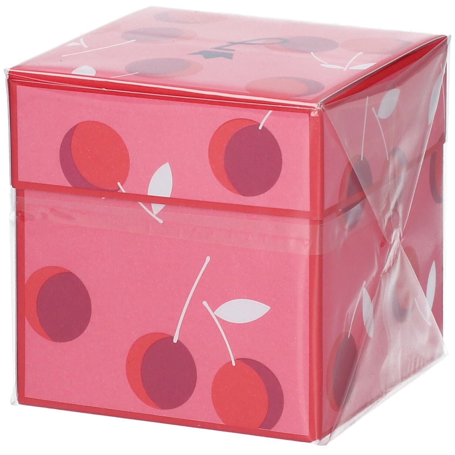 Boîte rose à motif cerise, emballée dans du film plastique. Moitié supérieure de la boîte visible. Aucune information produit.