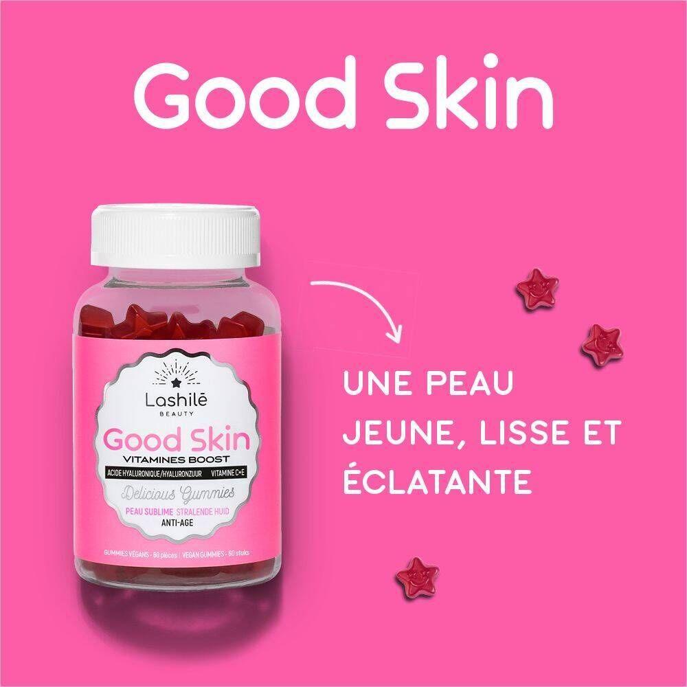 Produit et étoiles sur fond rose. Flacon avec texte Good Skin. Étoiles.