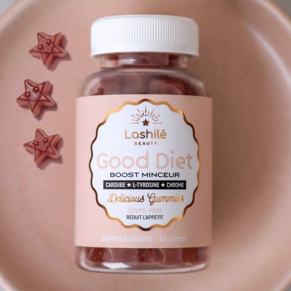 Flacon de gummies avec étoiles. Texte: Good Diet. Fond rose. 3 gummies en forme d'étoile.