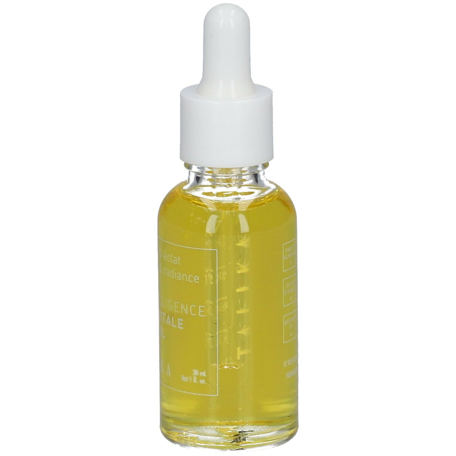 Flacon en verre d'huile jaune avec pipette. Inscription: Skintelligence Huile Vitale Vital Oil. Marque: Talika. 30 ml.