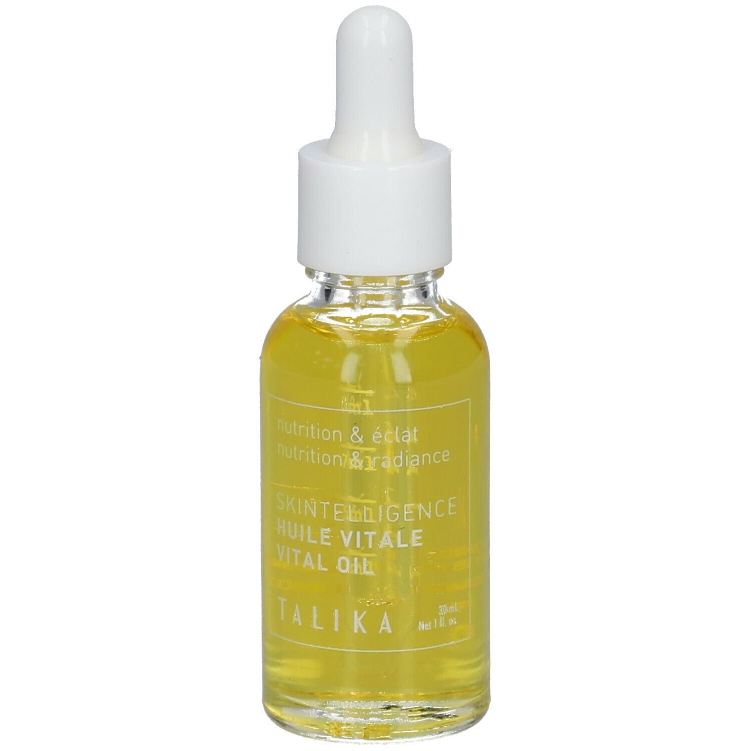 Flacon en verre d'huile jaune avec pipette. Inscription: Skintelligence Huile Vitale Vital Oil. Marque: Talika. 30 ml.