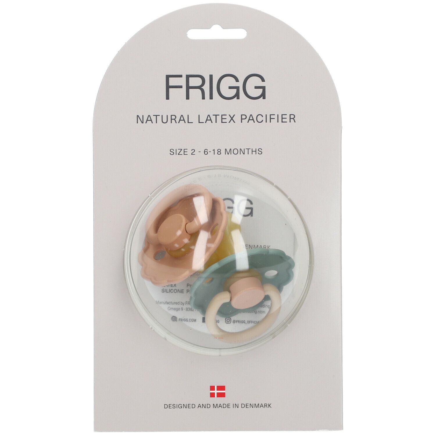Deux sucettes dans un emballage. Beige et bleu-vert. Inscription : FRIGG, NATURAL LATEX PACIFIER, TAILLE 2-6-18 MOIS.