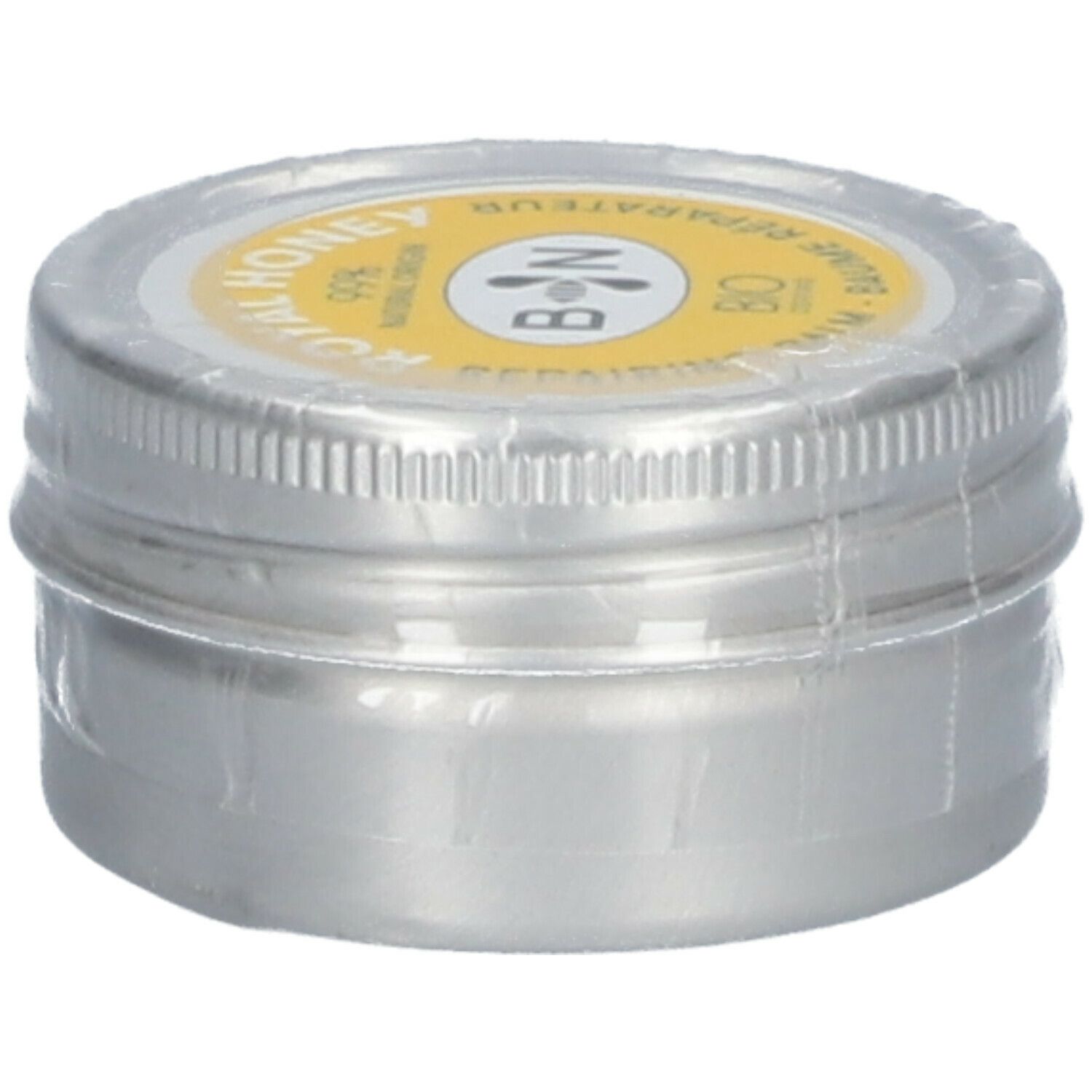 Ronde zilverkleurige pot met gele deksel. Opschrift: ROYAL HONEY, B N, BIO. Verzegeld met folie.