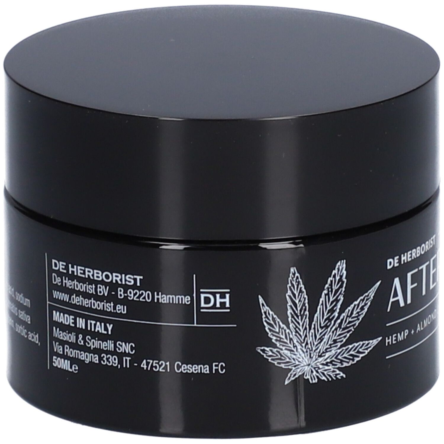 Zwarte pot met deksel. Opschrift: De Herborist, After Shave, Hennep + Amandelolie. Made in Italy. DH-logo.