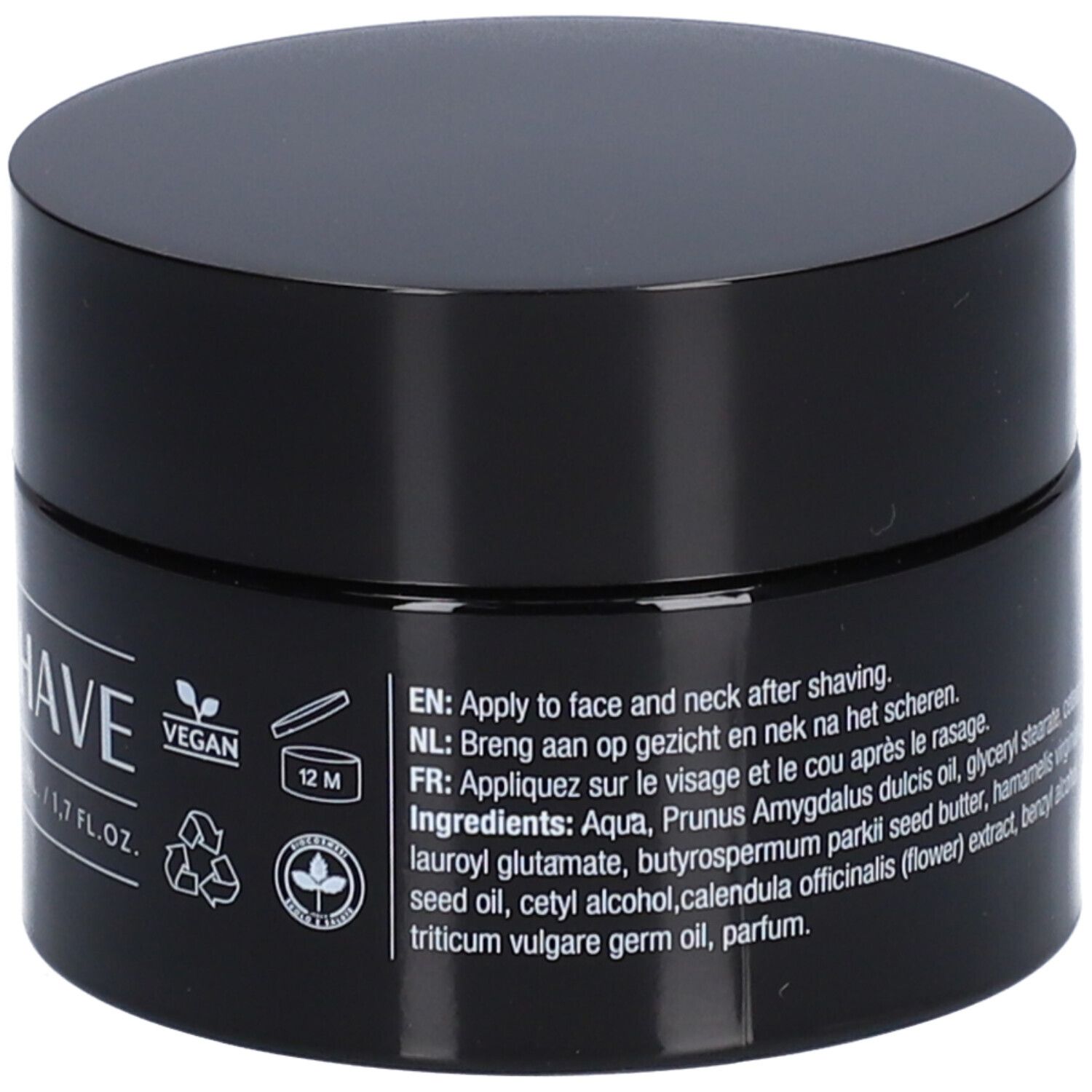 Zwarte pot met deksel. Opschrift: After Shave, Hennep + Amandelolie. Vegan-zegel. Ingrediënten in het Engels, Nederlands en Frans.