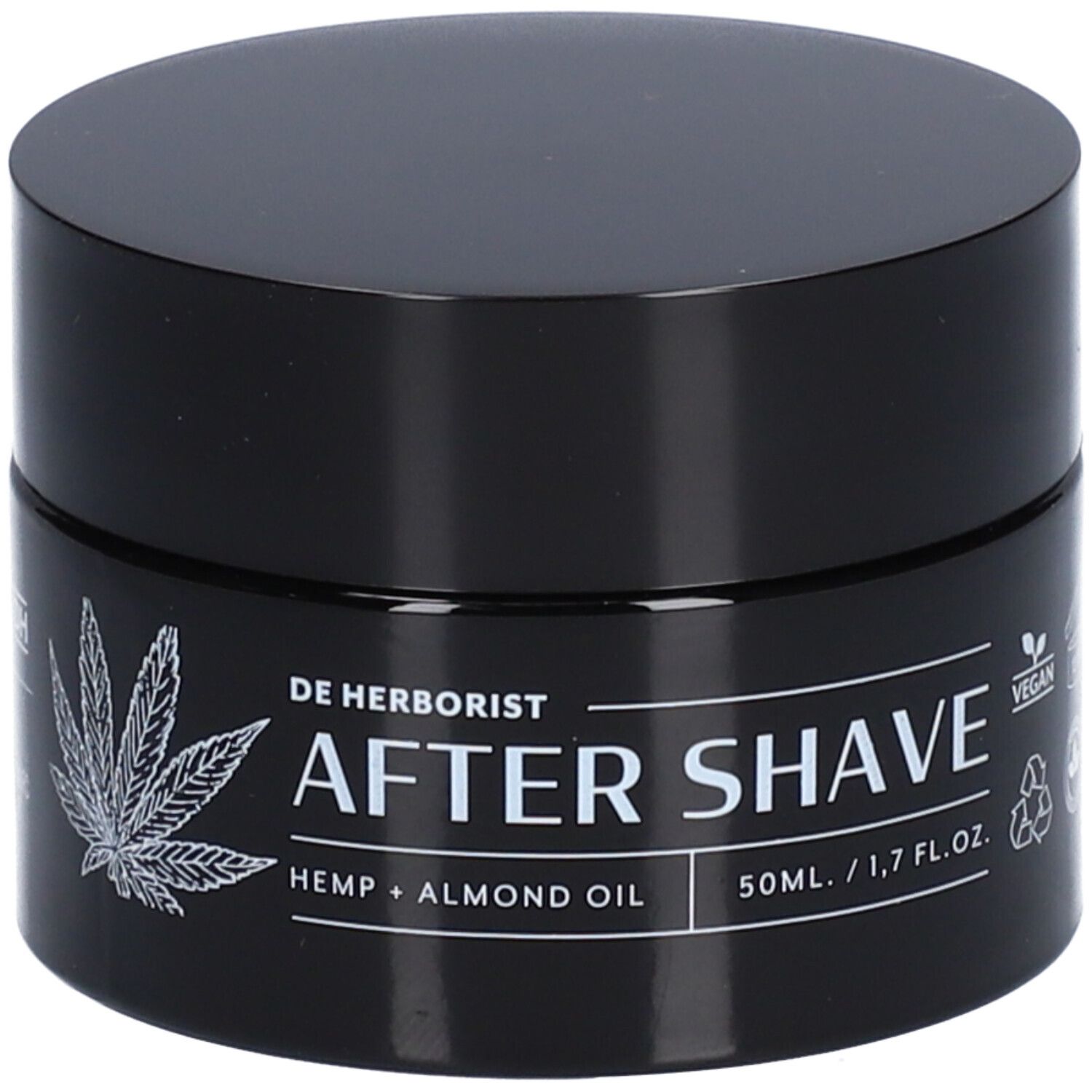 Zwarte pot met deksel. Opschrift: De Herborist, After Shave, Hennep + Amandelolie. Vegan-zegel. 50ml/1,7 fl.oz.
