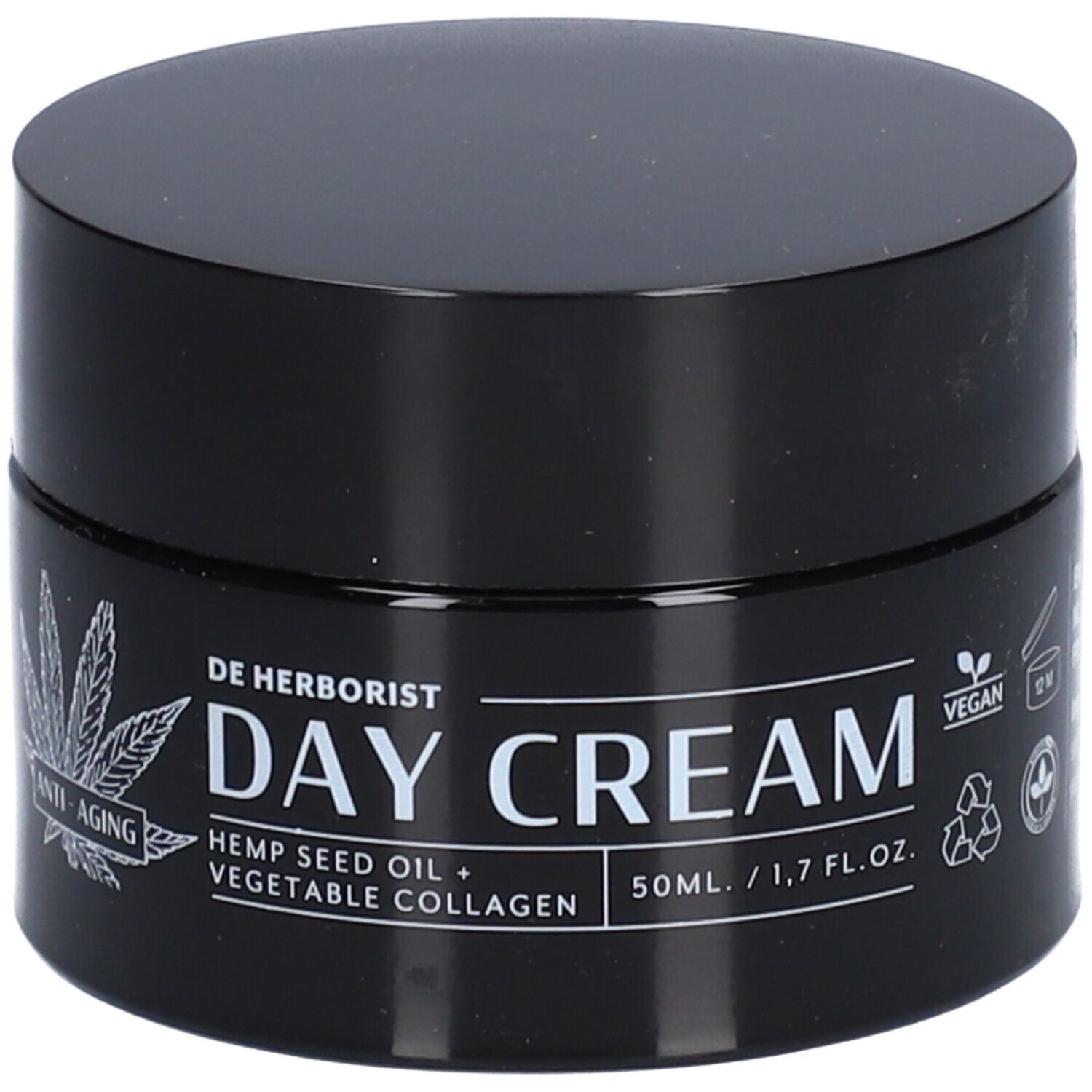 Pot noir avec couvercle. Inscription : DAY CREAM, huile de graines de chanvre + collagène végétal. Label végan.