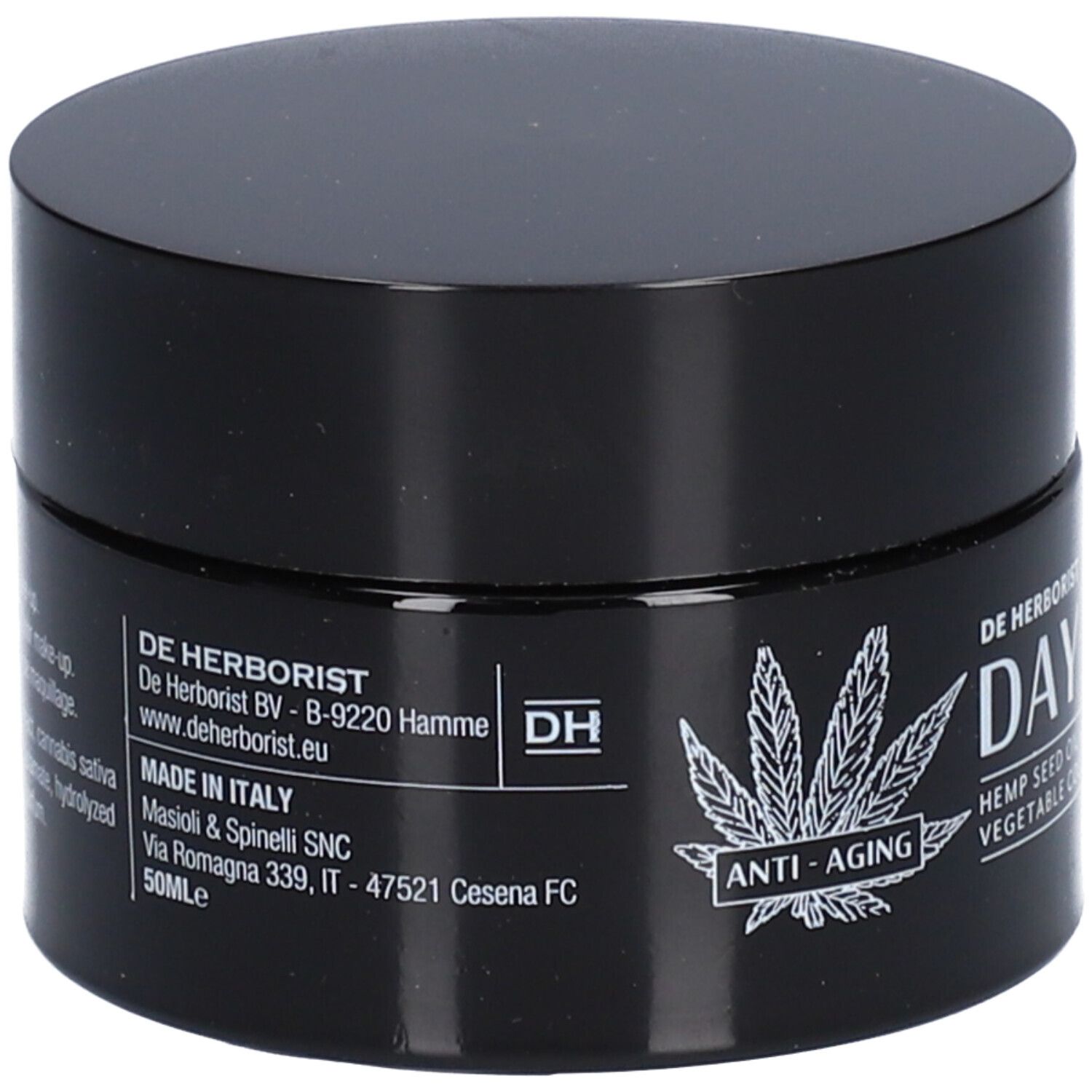 Pot noir avec couvercle. Inscription : DE HERBORIST, DAY CREAM, huile de graines de chanvre + collagène végétal. Fabriqué en Italie.
