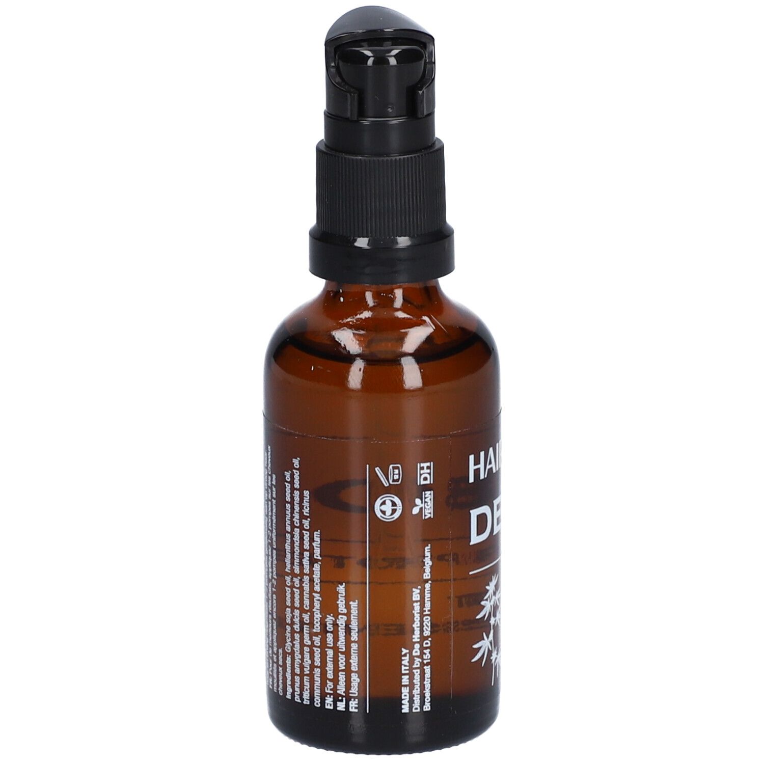 Flacon en verre brun avec pompe noire. Inscription: HAIR OIL, DE HERBORIST. Texte multilingue.