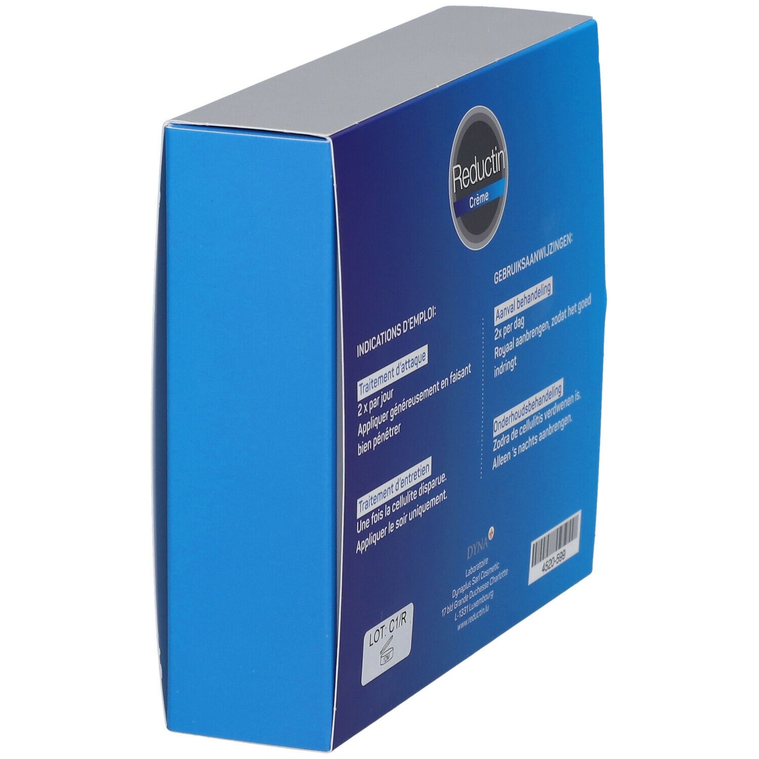 Boîte vue de côté. Surface bleue avec texte. Inscription "Reductin Crème". Texte en français et néerlandais.