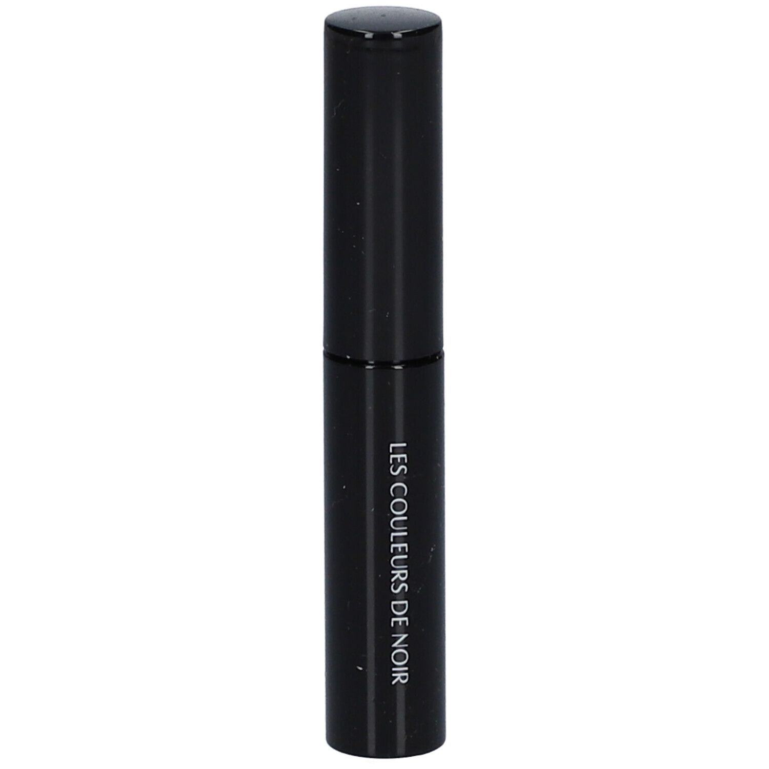 Tube noir avec bouchon. Inscription: LES COULEURS DE NOIR.