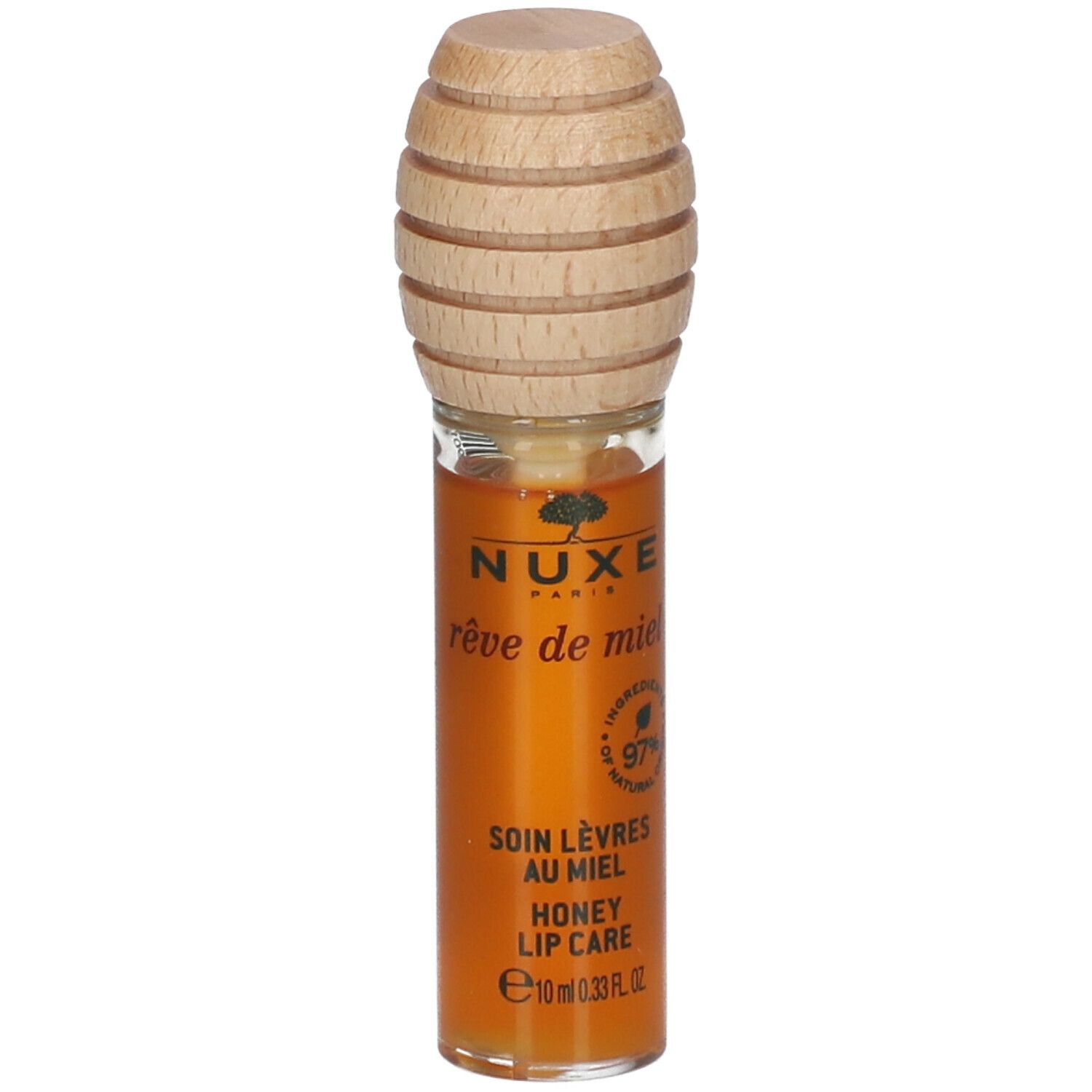 Soin lèvres au miel. Tube en verre avec bouchon en bois. Inscription: NUXE, Rêve de Miel, 97% ingrédients naturels.