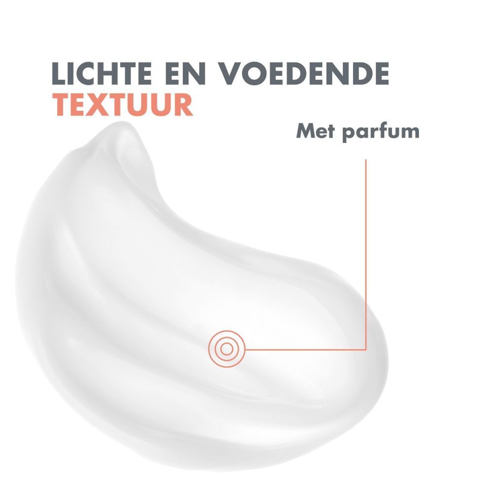 Close-up van crème met tekst: Lichte en voedende textuur, Met parfum.
