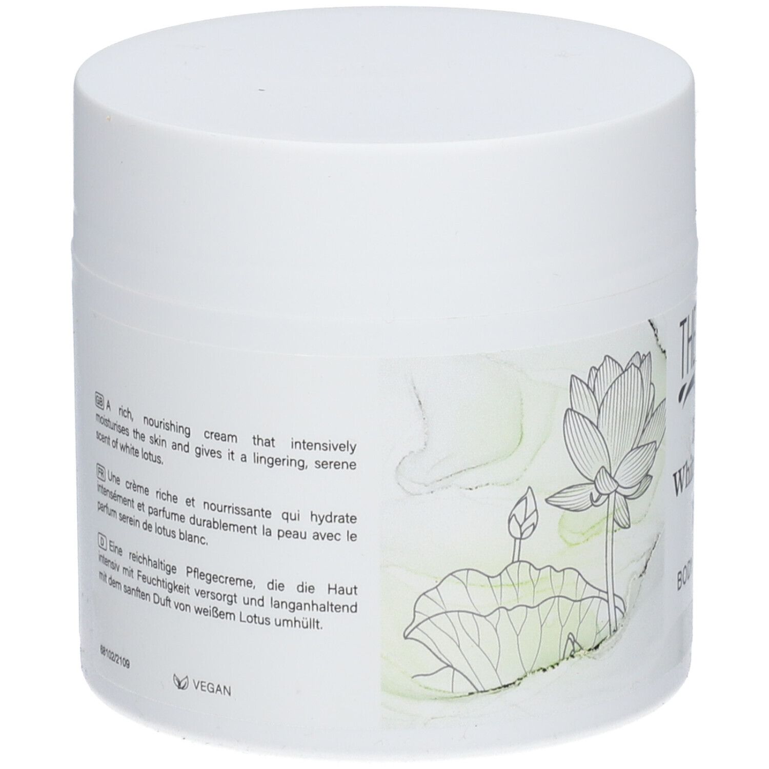 Achterkant witte pot THERME Zen White Lotus Body Butter. Tekst in meerdere talen.