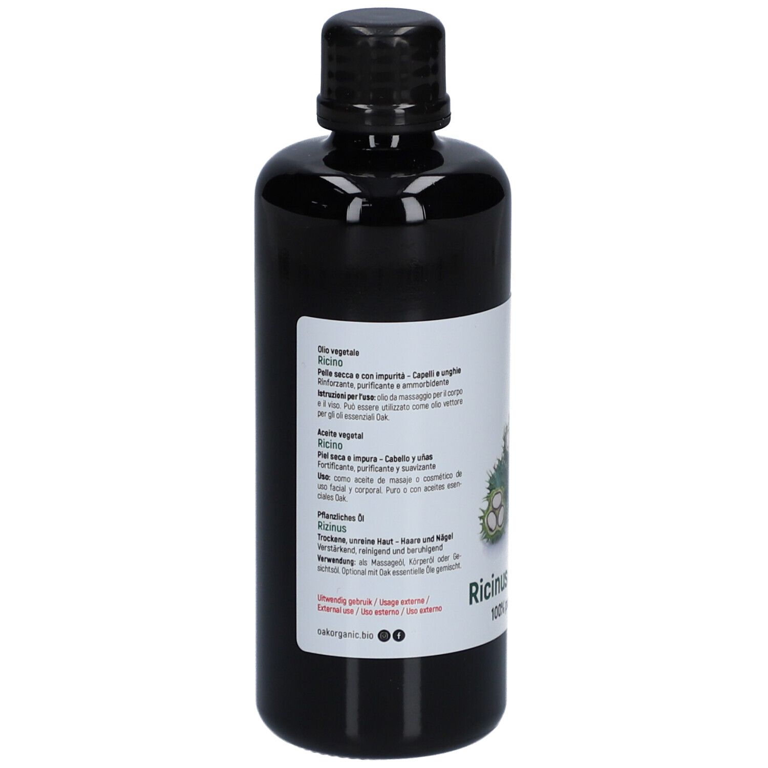 Dos d'une bouteille noire. Texte multilingue. Oak Organic, Ricinus communis, 100% pur & naturel.