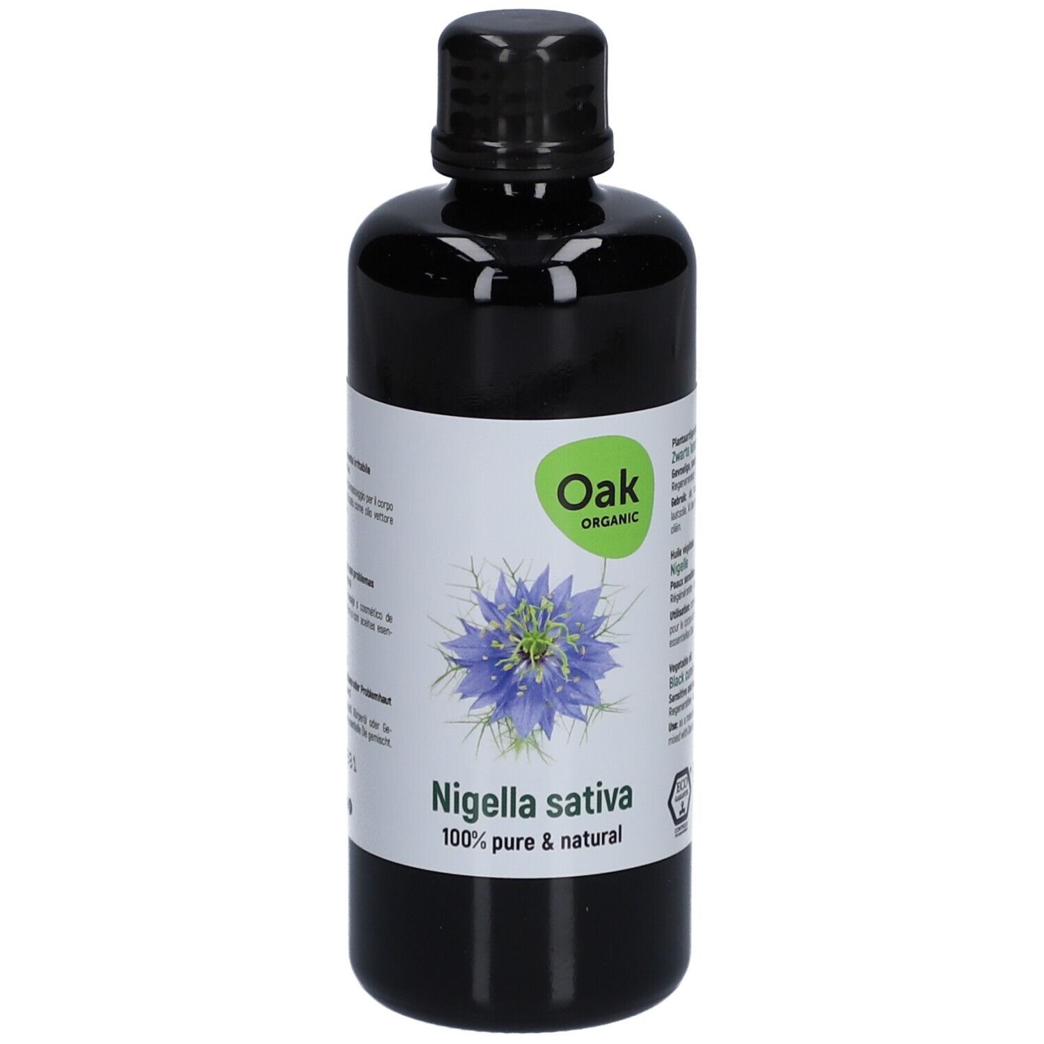 Flacon noir avec étiquette. Oak Organic Nigella sativa, 100% pur & naturel. Illustration de fleur.