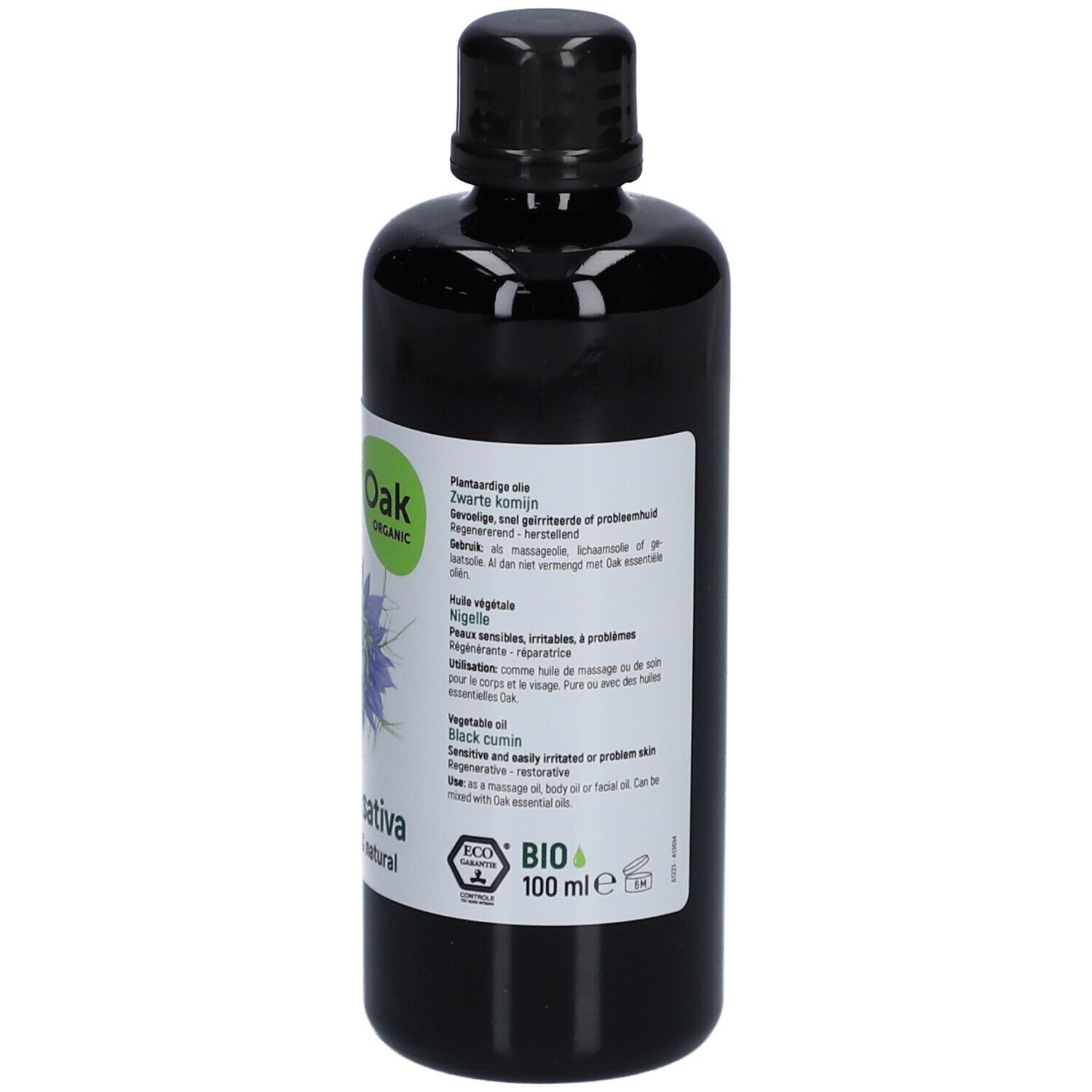 Flacon noir avec étiquette. Oak Organic, 100 ml. Nigella sativa. Certification bio. Illustration de fleur.