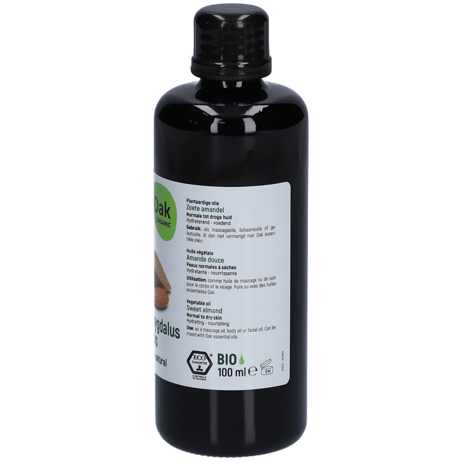Schwarze Flasche mit Etikett. Etikett mit Text in mehreren Sprachen. Oak Organic, Mandeln, Prunus amygdalus dulcis, 100% rein & natürlich.