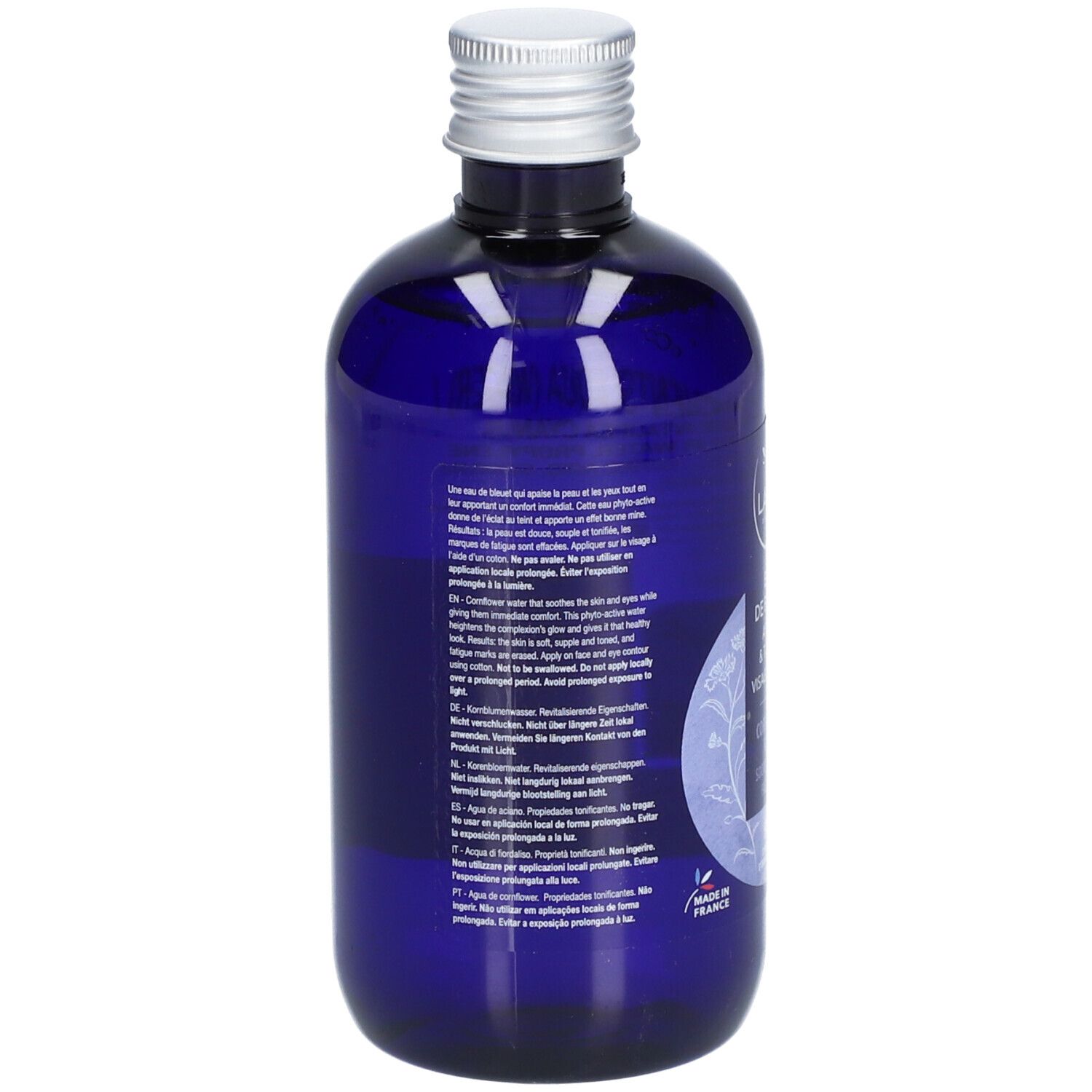 Rückseite einer blauen Flasche mit silbernem Deckel. Text in mehreren Sprachen. Enthält Informationen zur Anwendung und Inhaltsstoffe.