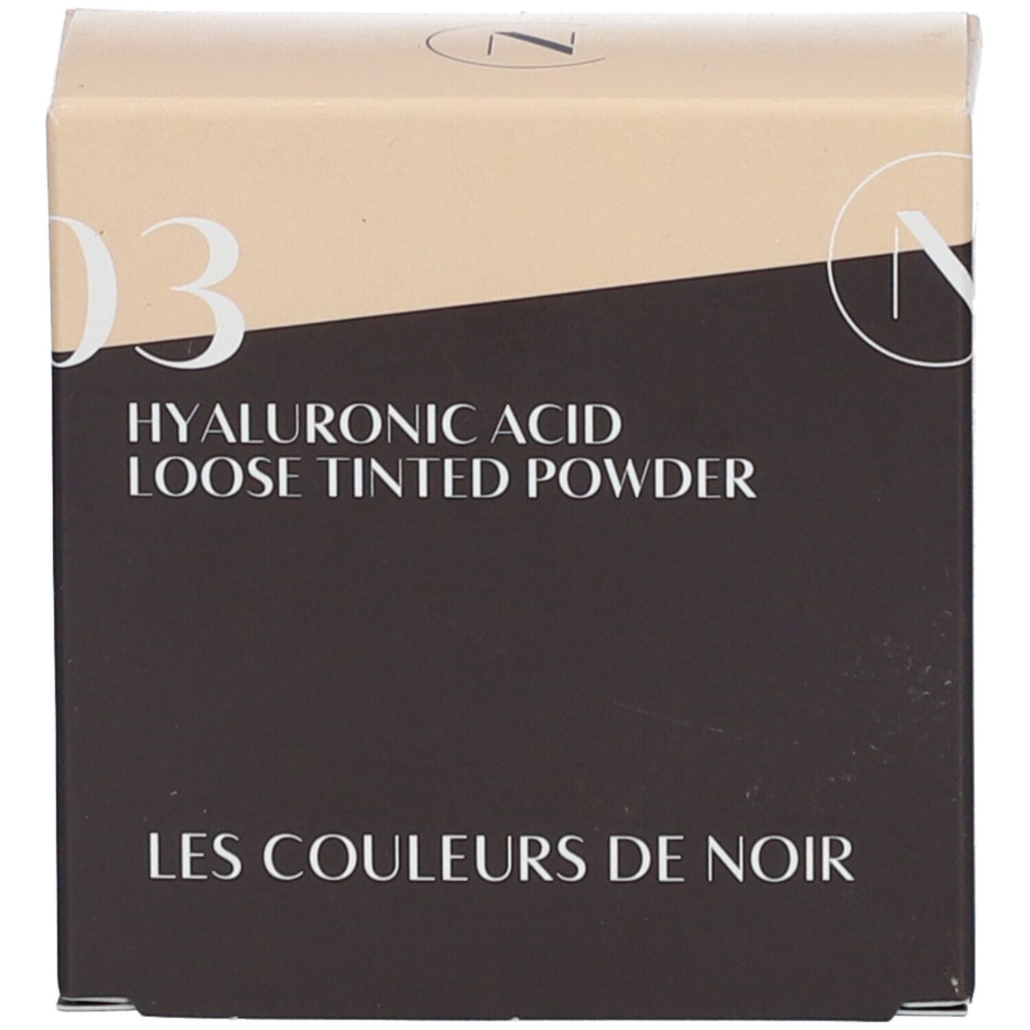 Kartonverpackung mit Aufschrift: LES COULEURS DE NOIR, HYALURONIC ACID LOOSE TINTED POWDER.