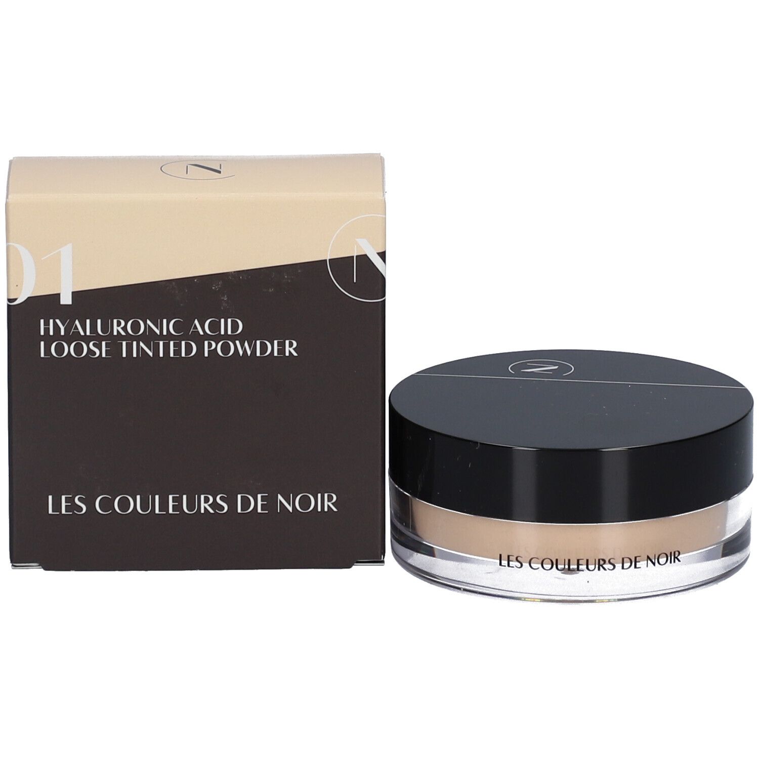 Produktverpackung mit Puderbehälter. Karton mit Aufschrift: HYALURONIC ACID LOOSE TINTED POWDER. Behälter: LES COULEURS DE NOIR.
