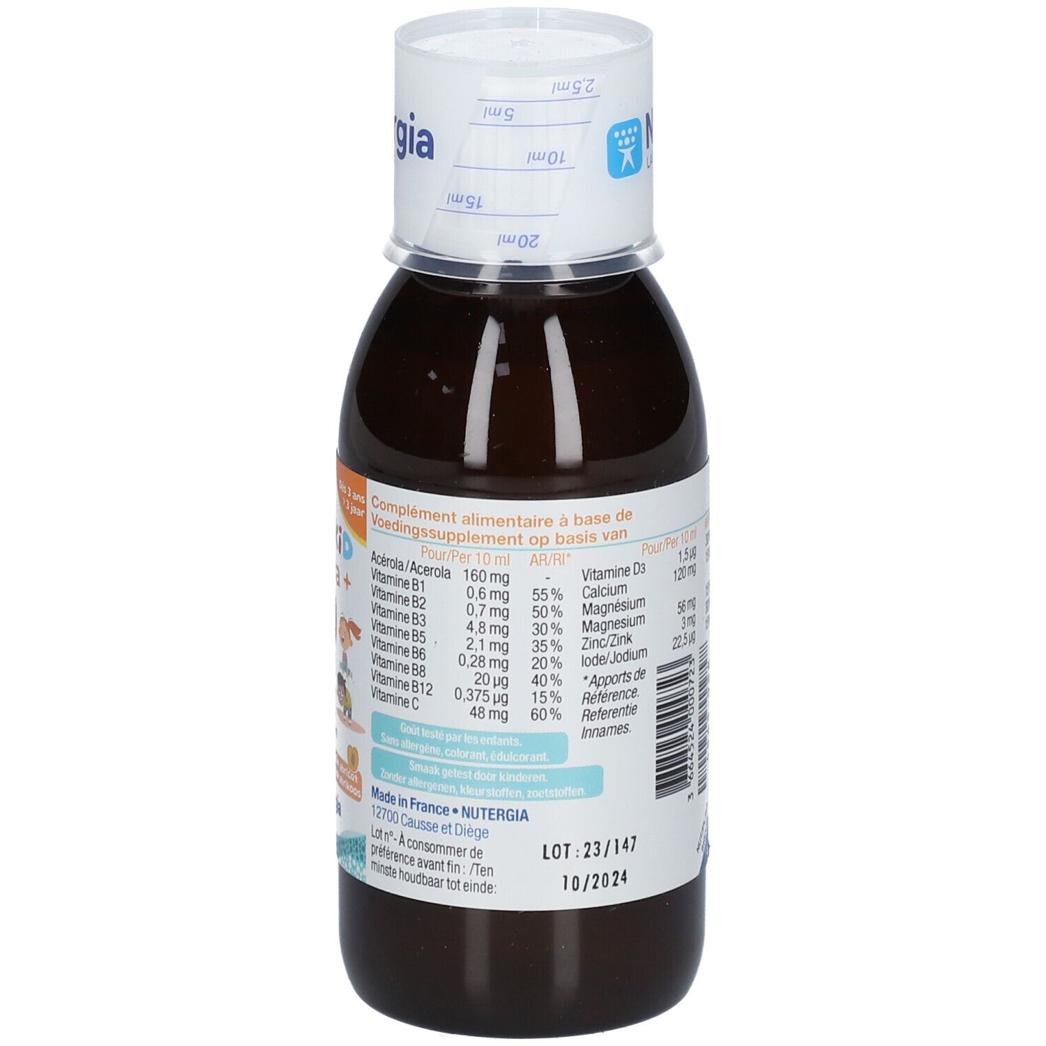 Flacon brun avec bouchon blanc. Inscription : ERGYKID Vita+. Informations nutritionnelles. Marque : Nutergia. Date de péremption.