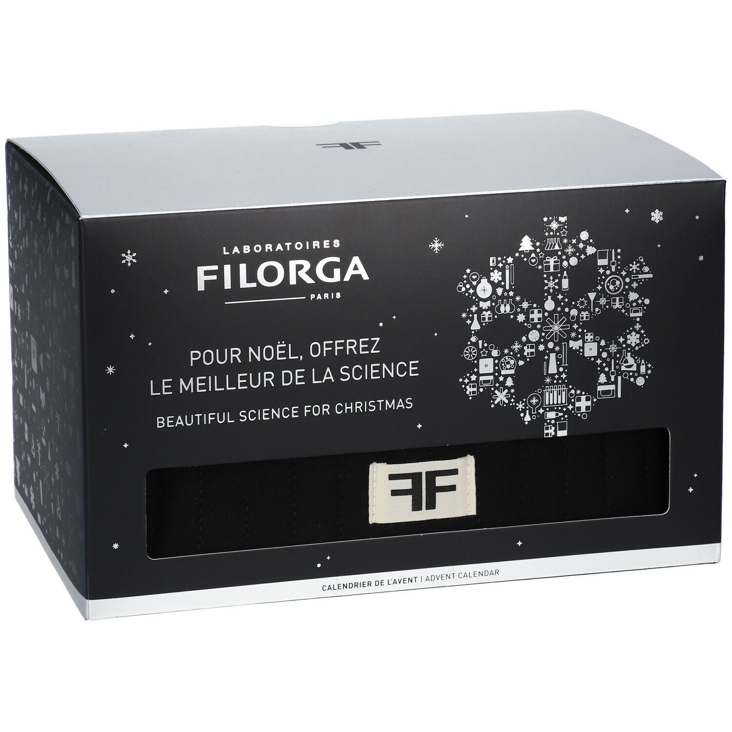 Coffret avec logo "Filorga" et texte. Fenêtre avec logo "FF". "Calendrier de l'Avent" en dessous. Fond noir.