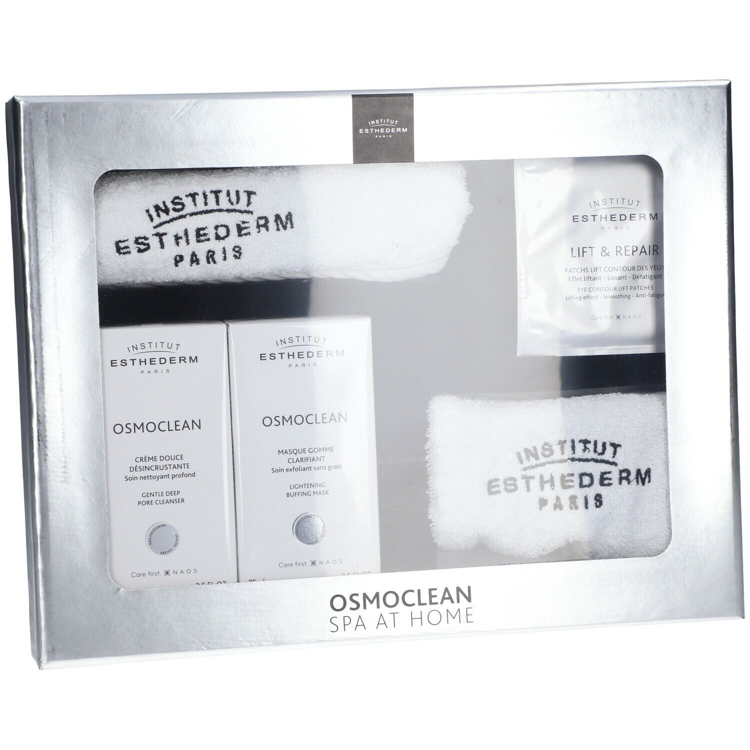 Cadeauset met cosmetica en handdoeken. Merk: Institut Esthederm Paris. Zilverkleurige doos met venster.
