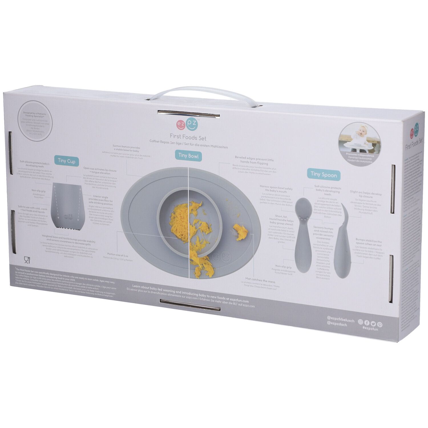 Verpackung eines grauen Baby-Esssets mit Becher, Schüssel und Löffeln.
