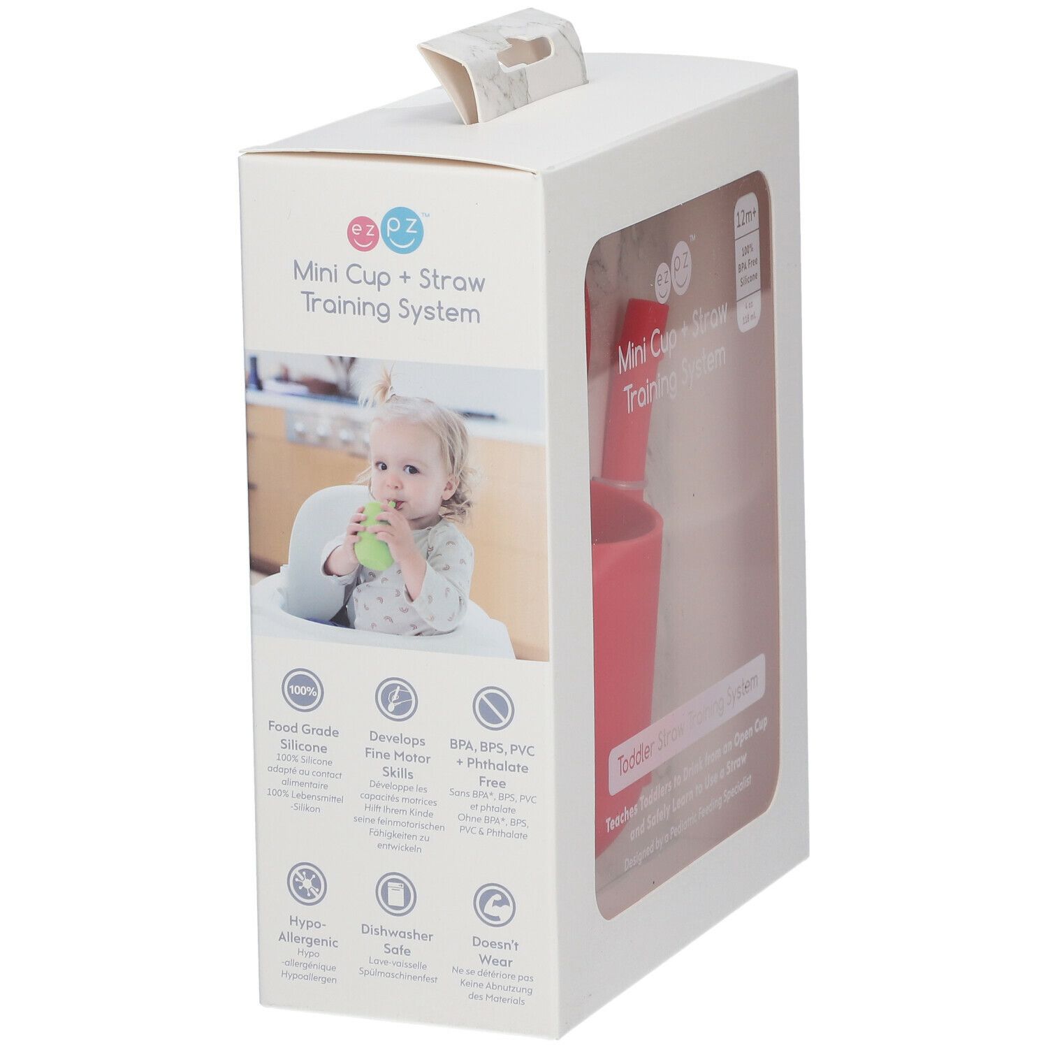 Emballage EzPz Mini Tasse + Paille Corail. Enfant buvant. Caractéristiques : sans BPA, lavable au lave-vaisselle, etc.