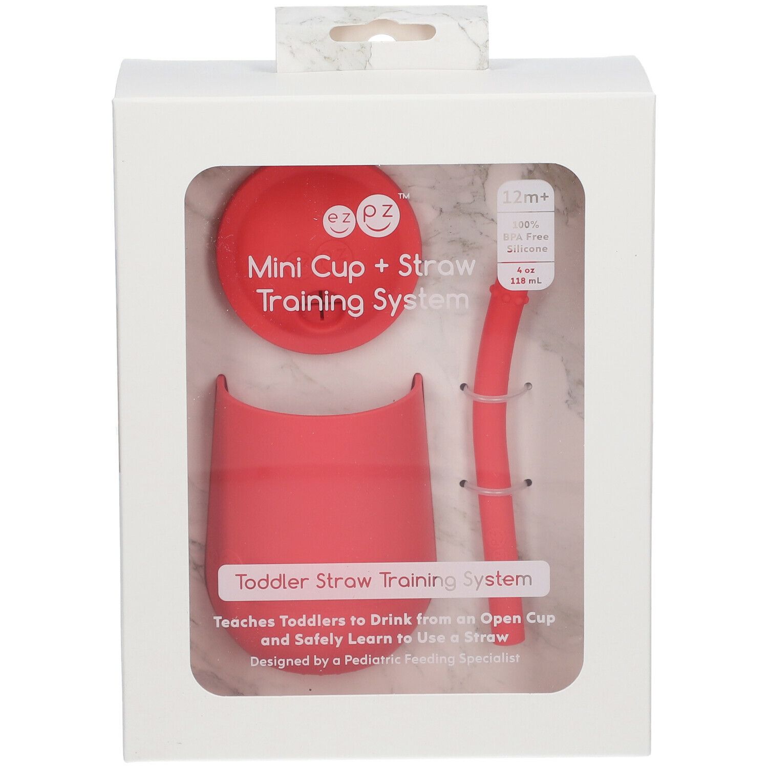 Emballage EzPz Mini Tasse + Paille Corail. Comprend tasse, couvercle et paille. Silicone corail. Fenêtre transparente.