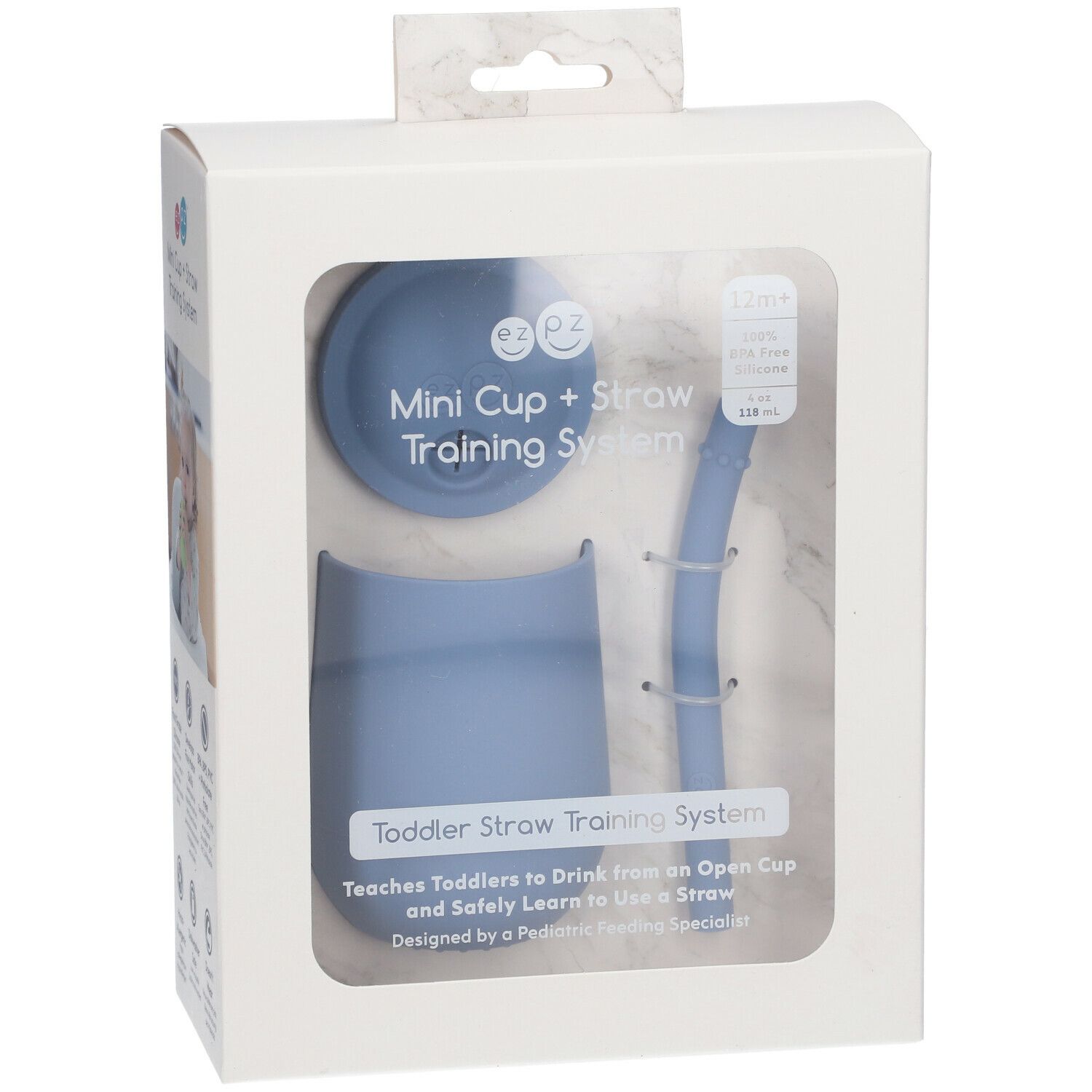 Verpakking met blauwe mini-beker, deksel en rietje. Tekst: Mini Cup + Straw Training System.