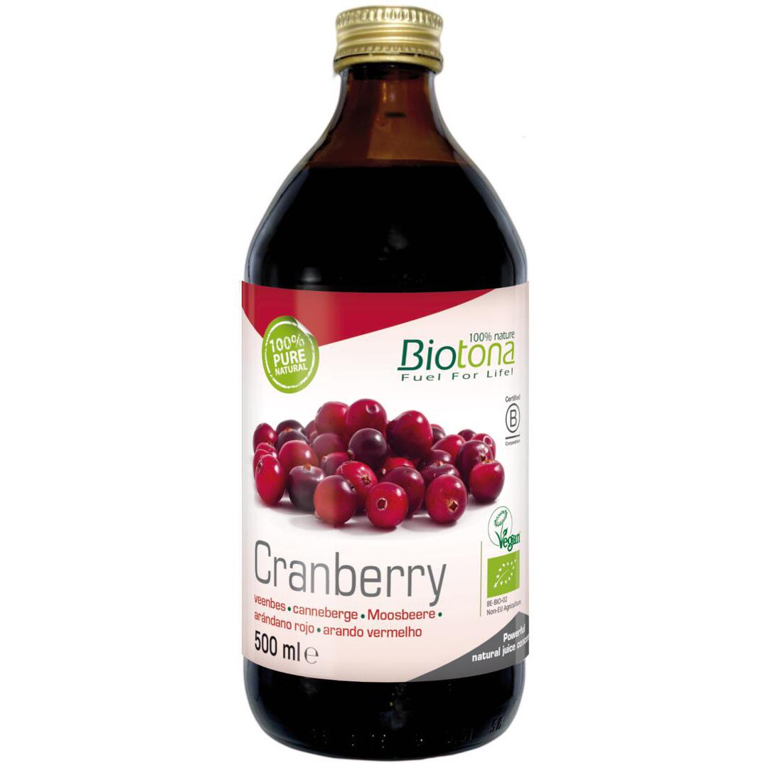 Bruine glazen fles met cranberrysap. Etiket met cranberry afbeelding, tekst en logo. 500 ml.