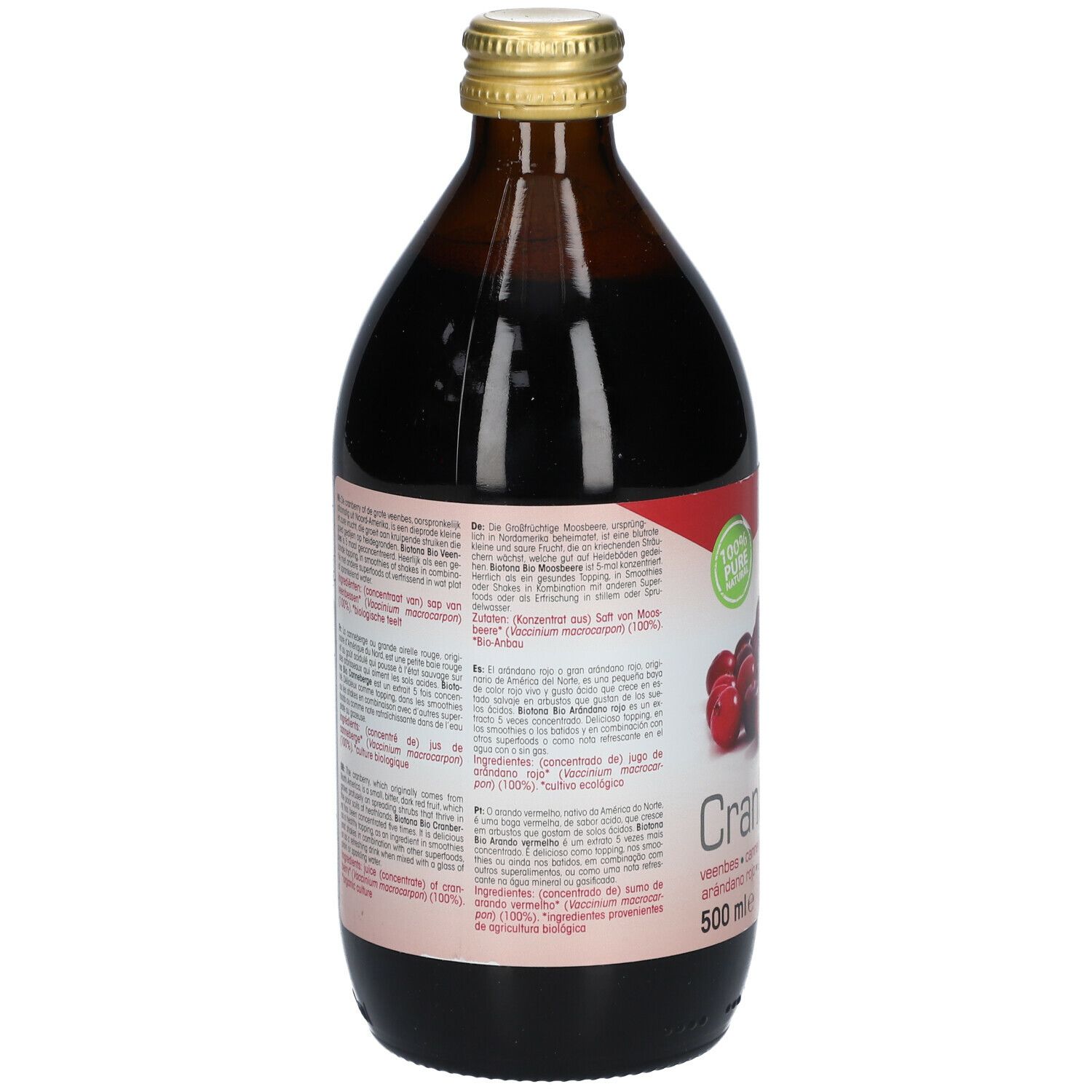 Achterkant van de bruine glazen fles met cranberrysap. Etiket met tekst en logo. 500 ml.