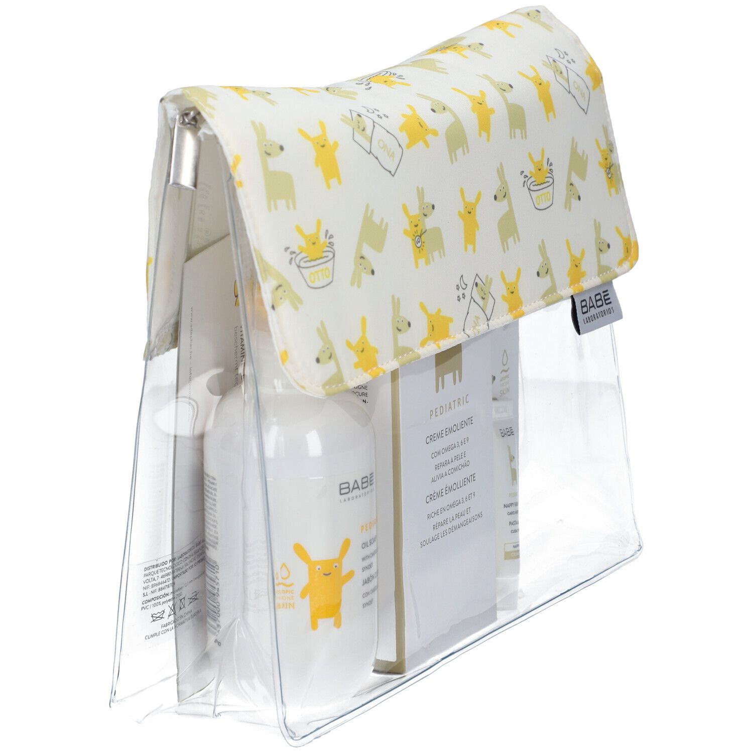 Klare Tasche mit BABÉ-Produkten. Enthält Flaschen, Tuben und Kartons. Deckel mit gelben Tier-Muster.