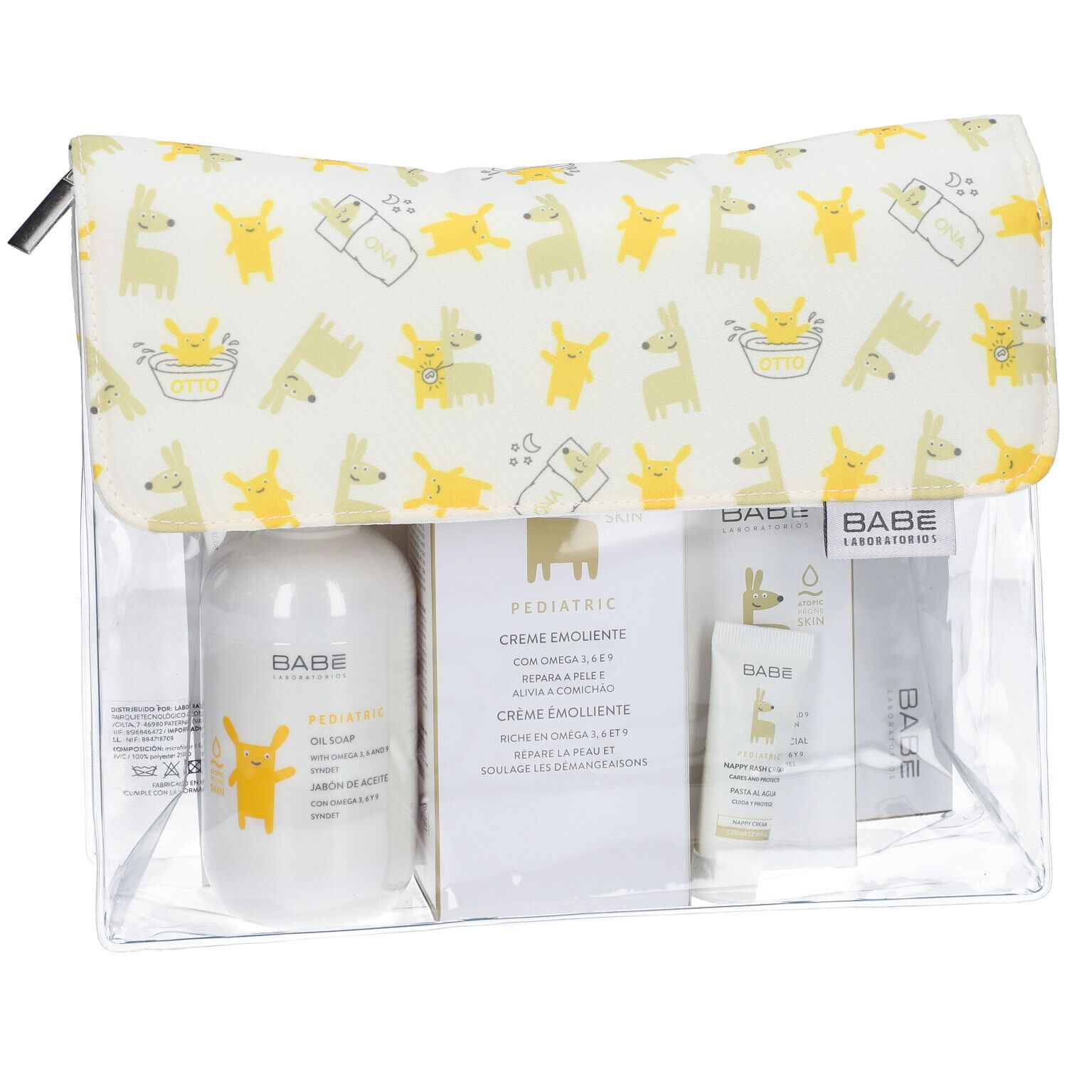 Klare Tasche mit BABÉ-Produkten. Enthält Flaschen, Tuben und Kartons. Deckel mit gelben Tier-Muster.