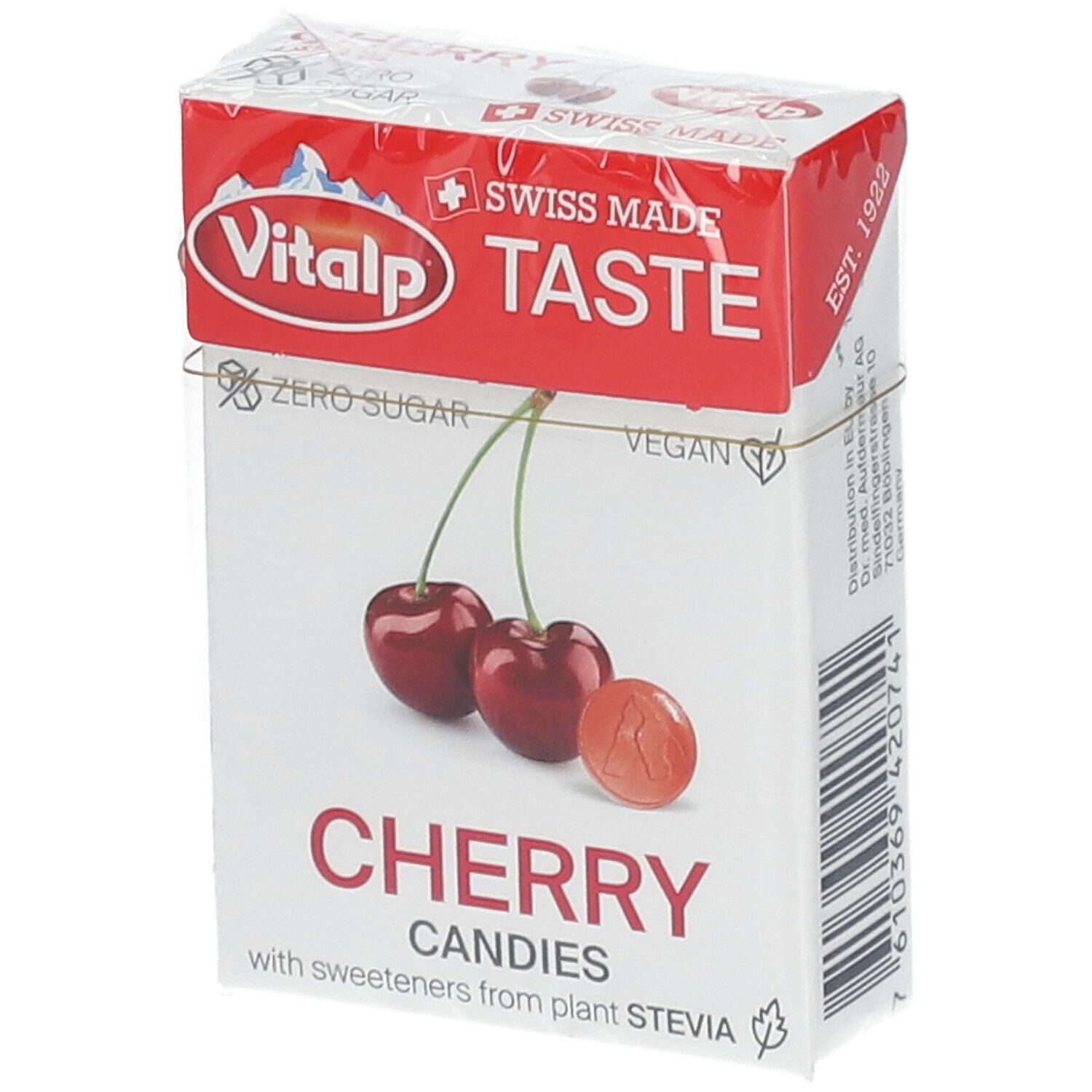 Verpakking met kersenbonbons. Opschrift: Vitalp, Cherry Candies, Swiss Made. Afbeelding van kersen.