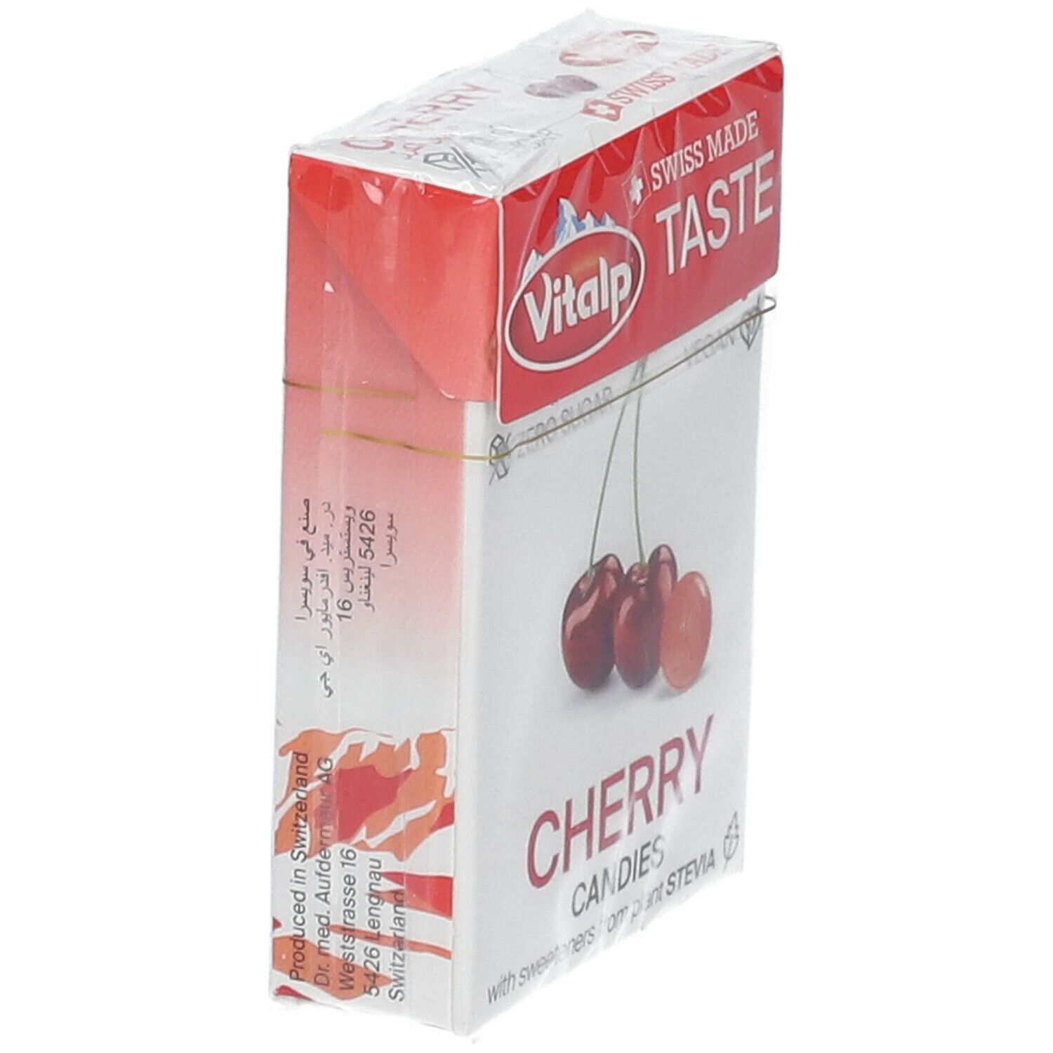 Schuine weergave van de verpakking met kersenbonbons. Opschrift: Vitalp, Cherry Candies, Swiss Made. Kersenafbeelding.