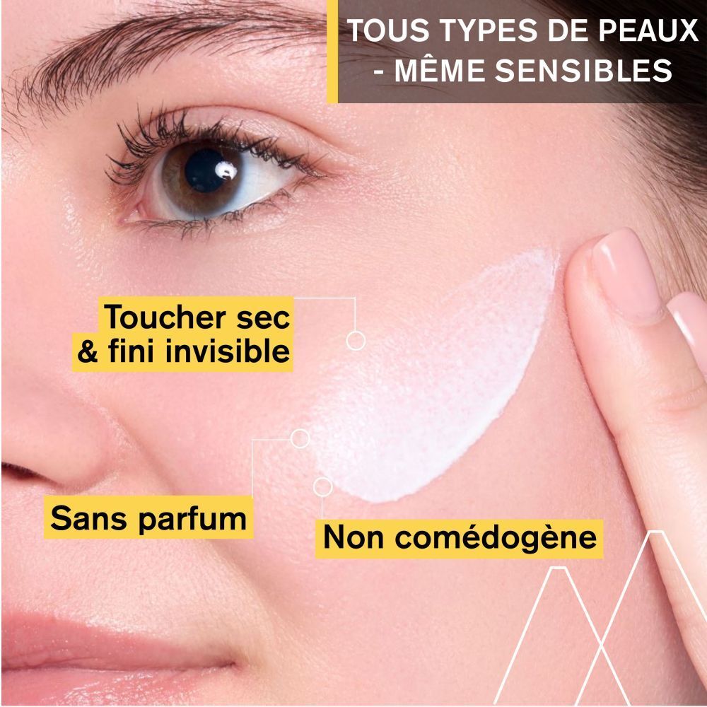 Visage avec application produit. Texte: Toucher sec, invisible.