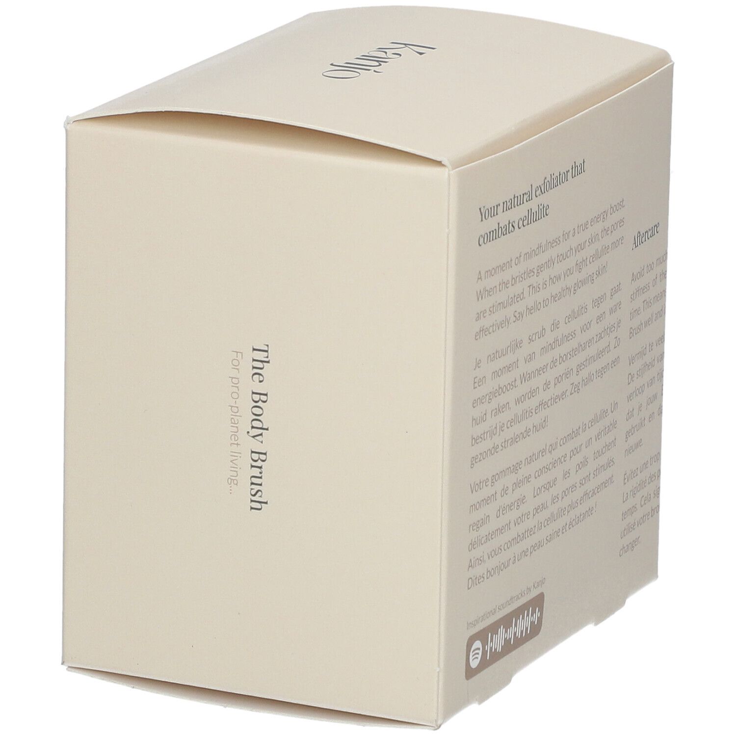 Emballage crème avec texte. Inscription "Kanjo" et "The Body Brush".