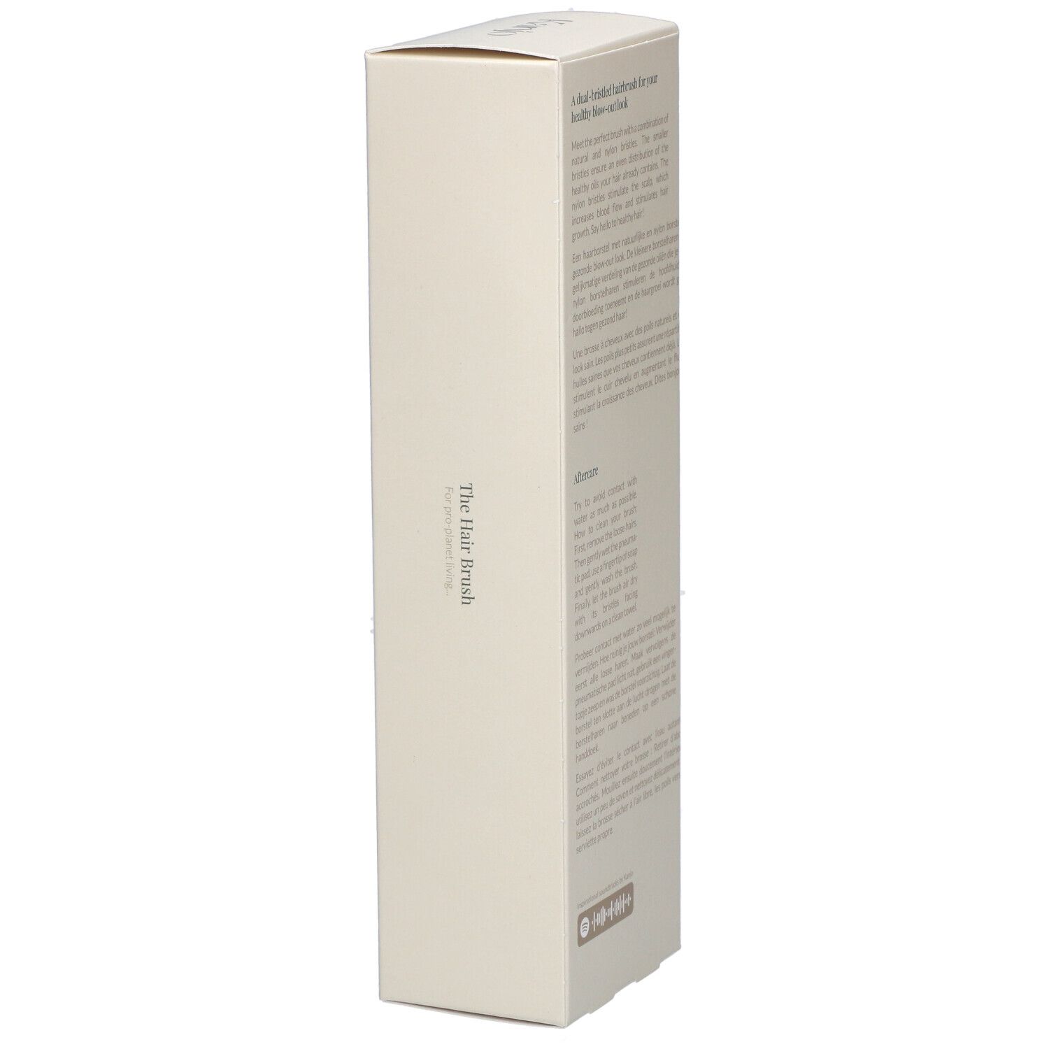 Verpackung der Kanjo Haarbürste. Text auf Englisch. Holzgriff, helle Borsten.