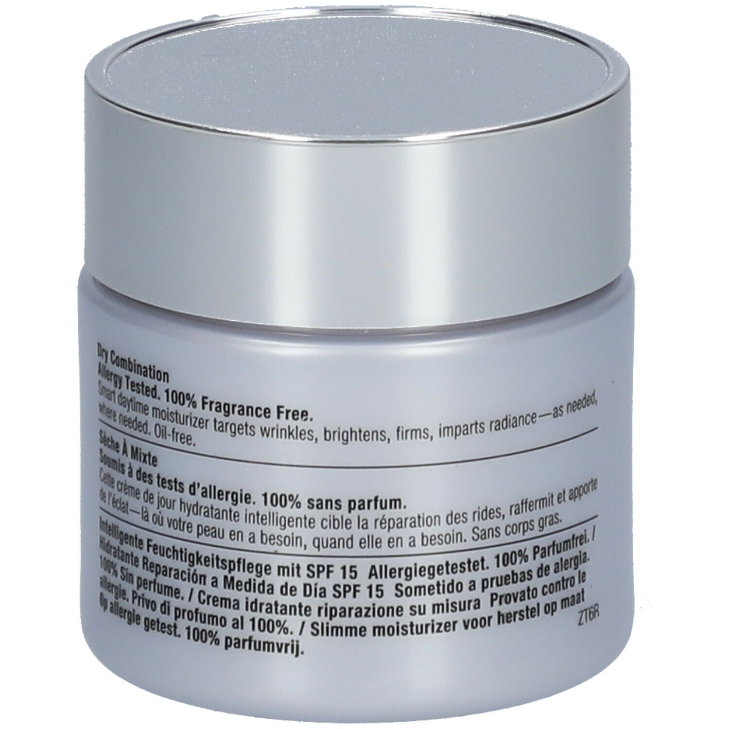 Pot de crème avec couvercle argenté. Texte au dos. Pour peaux sèches à mixtes. 100% sans parfum.