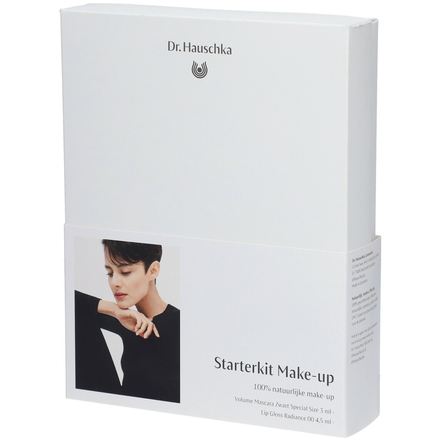 Boîte blanche avec image produit et texte Starterkit Make-up. Marque Dr. Hauschka. Contient mascara et brillant à lèvres.